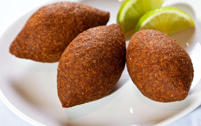 Order Kibbeh 3 PC and Tzatziki Sauce. - Side food online from Gyro 101 store, Phoenix on bringmethat.com