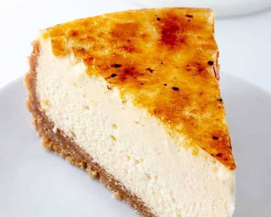 Order X-Large Creme Brulee Cheesecake Slice with Whip Cream food online from Ny Popcorn store, New York on bringmethat.com