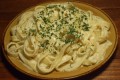 Order Fettuccini Alfredo food online from Guidos Pizza and Pasta store, Tujunga on bringmethat.com