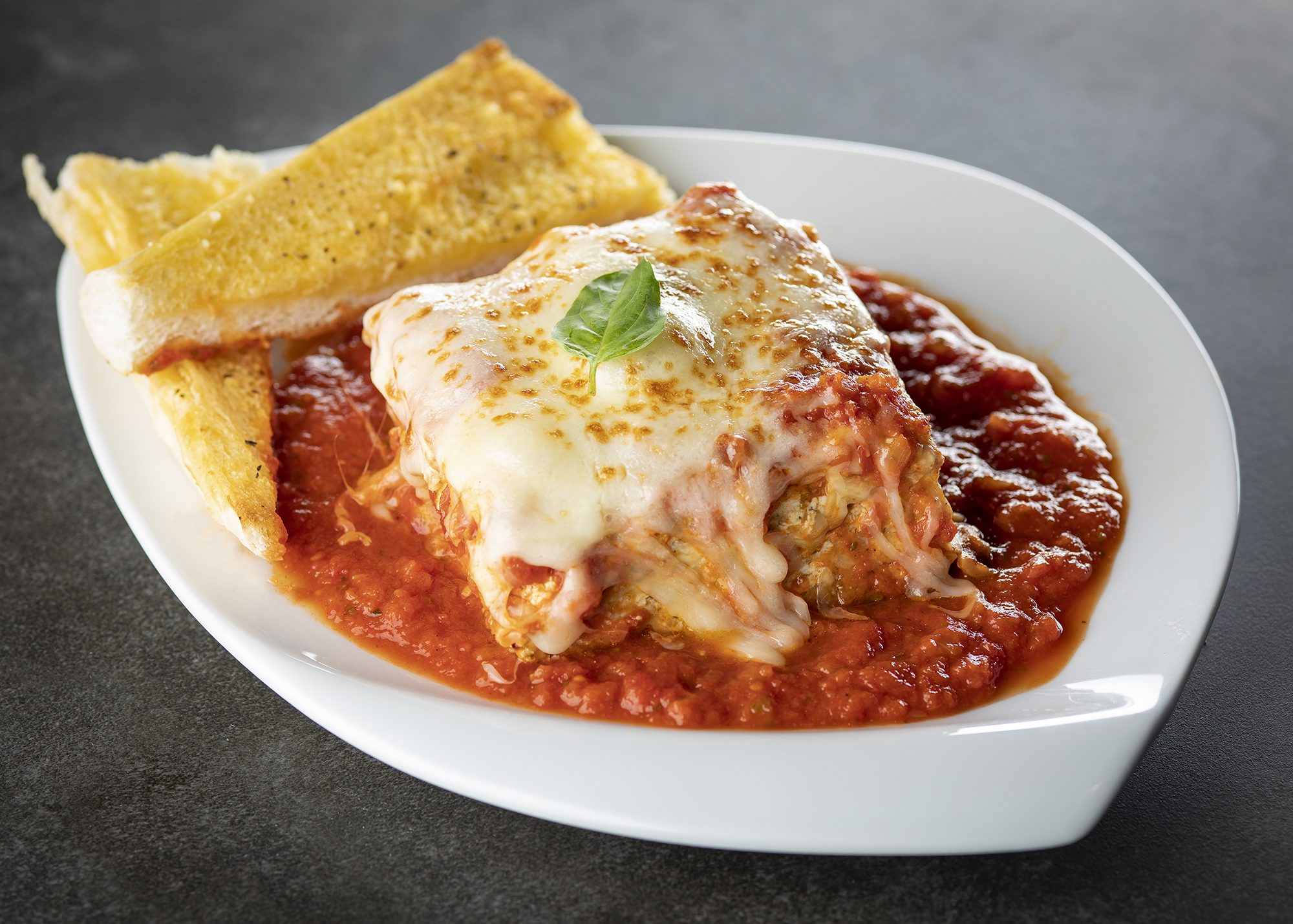 Order Baked Lasagna Individual Pasta food online from Papa Saverios Pizzeria store, West Chicago on bringmethat.com