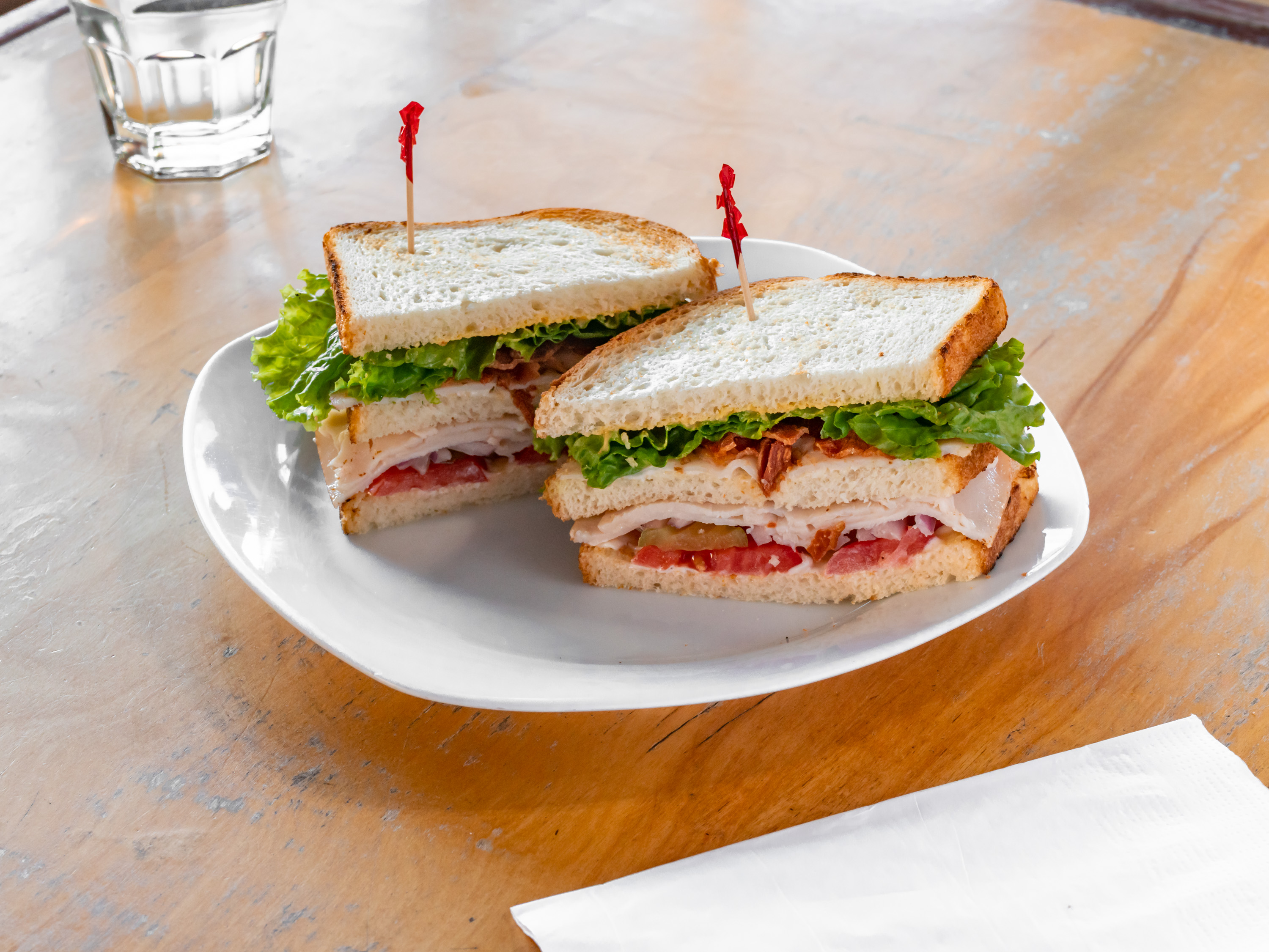 Order Turkey Club Sandwich  food online from 901 Columbus Cafe store, San Francisco on bringmethat.com