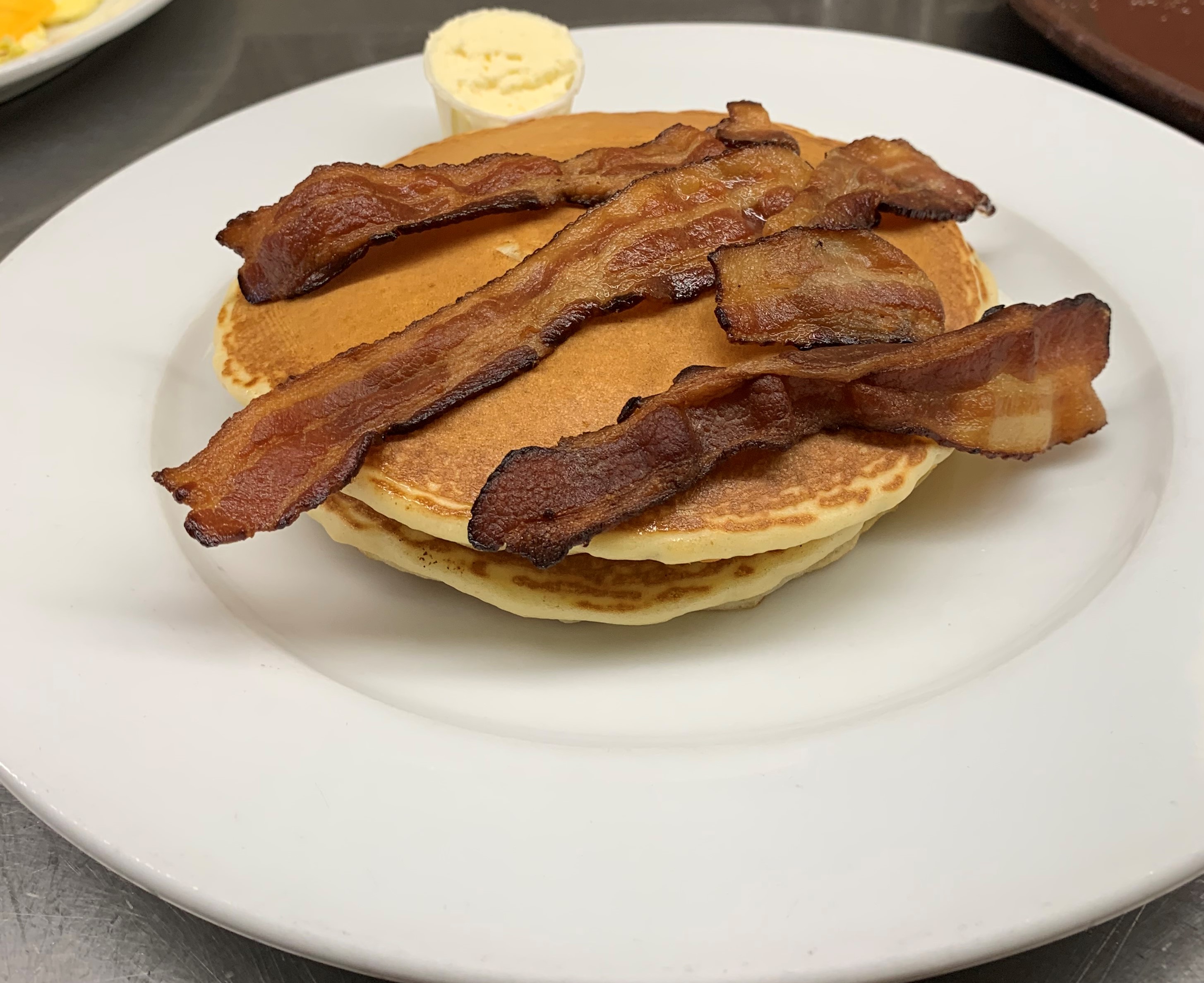 Order Golden Brown Pancakes with Breakfast Meat food online from Mark Twain Diner Restaurant store, Union on bringmethat.com