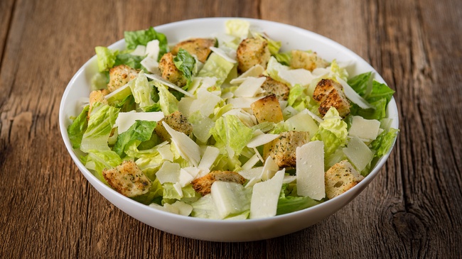 Order Caesar Salad food online from Rascal House Pizza store, Maple Heights on bringmethat.com
