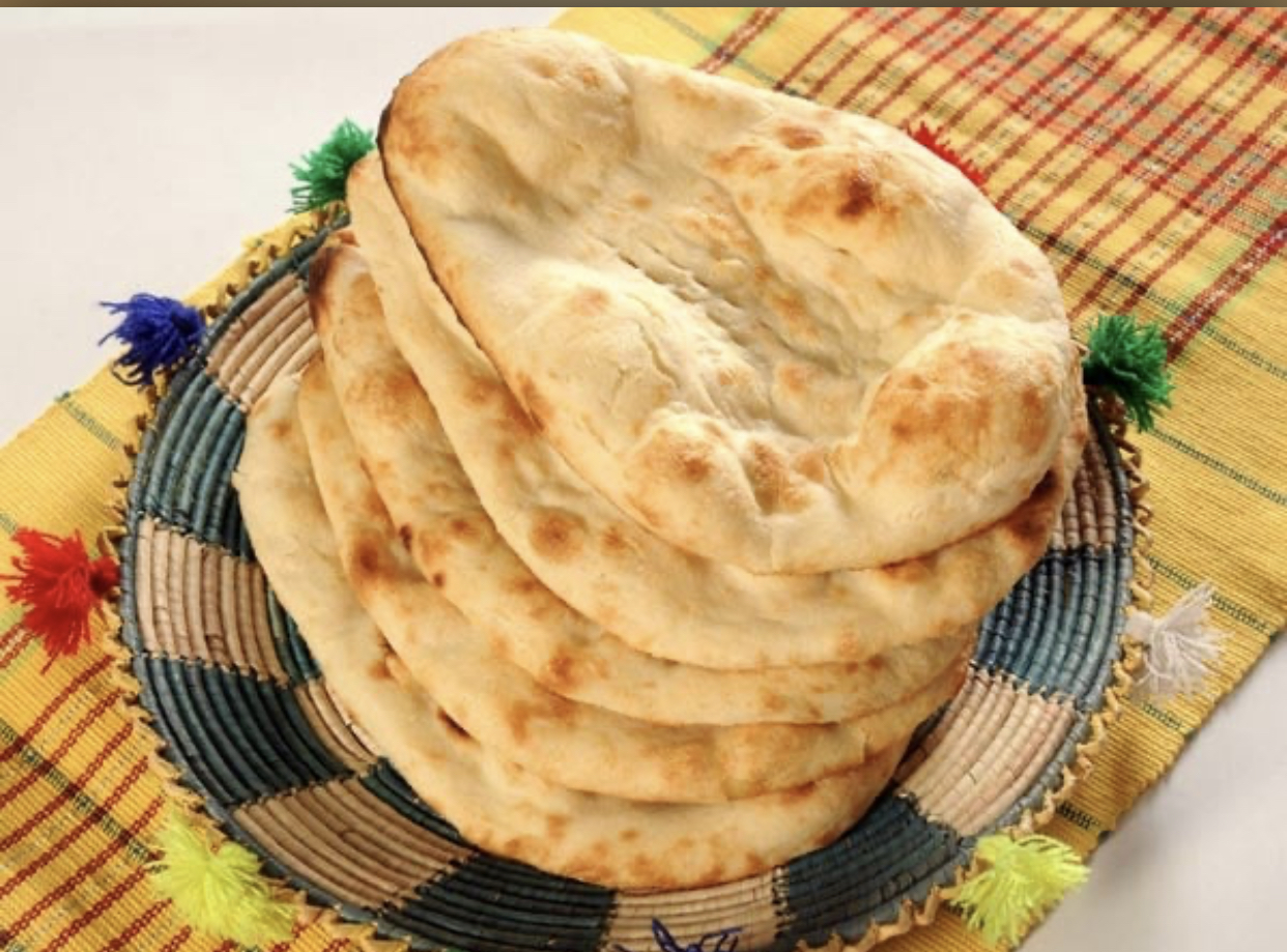 Order Naan food online from Tandoori Restaurant store, Villa Park on bringmethat.com