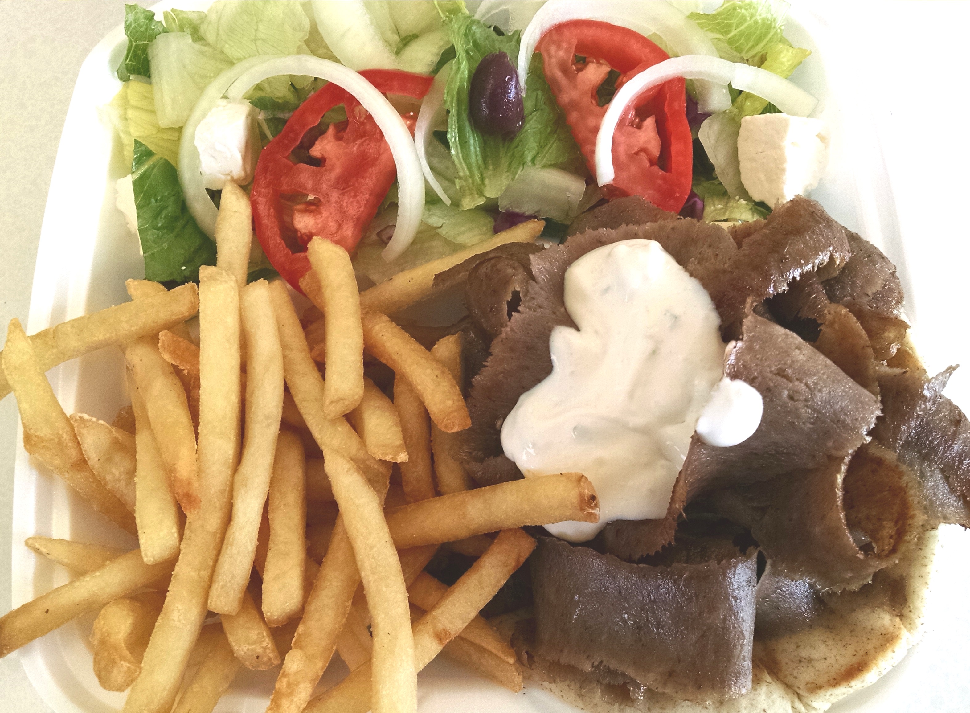 Order Gyros Plate food online from Kojak store, Cary on bringmethat.com