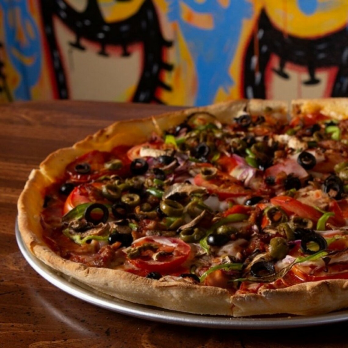 Order Mopac (14") food online from Austin's Pizza store, Austin on bringmethat.com