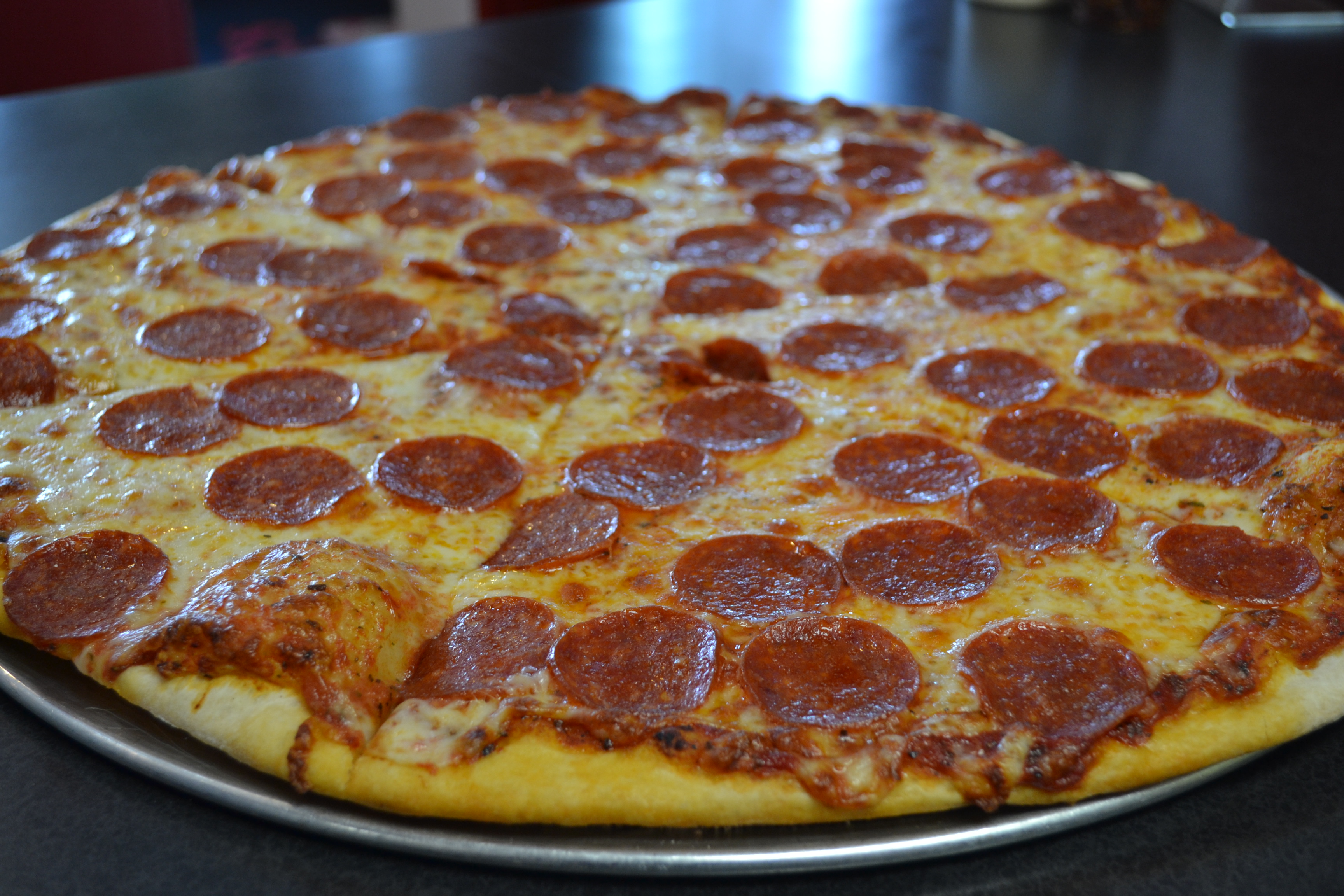 Order Pepperoni Pizza Slice food online from Lukes store, Lake Bluff on bringmethat.com