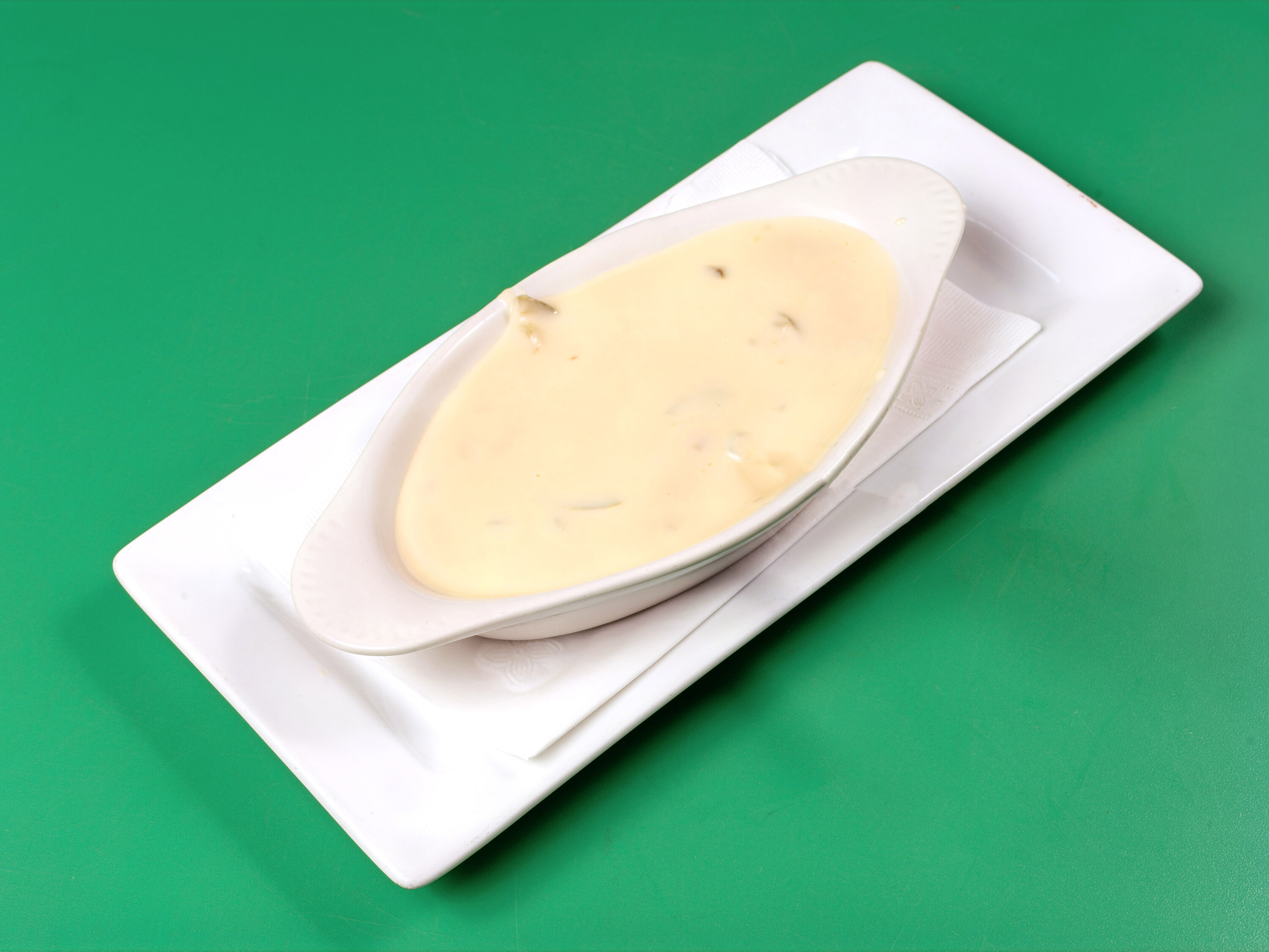 Order Queso Dip food online from Casa Blanca Mexican Restaurant store, North Billerica on bringmethat.com
