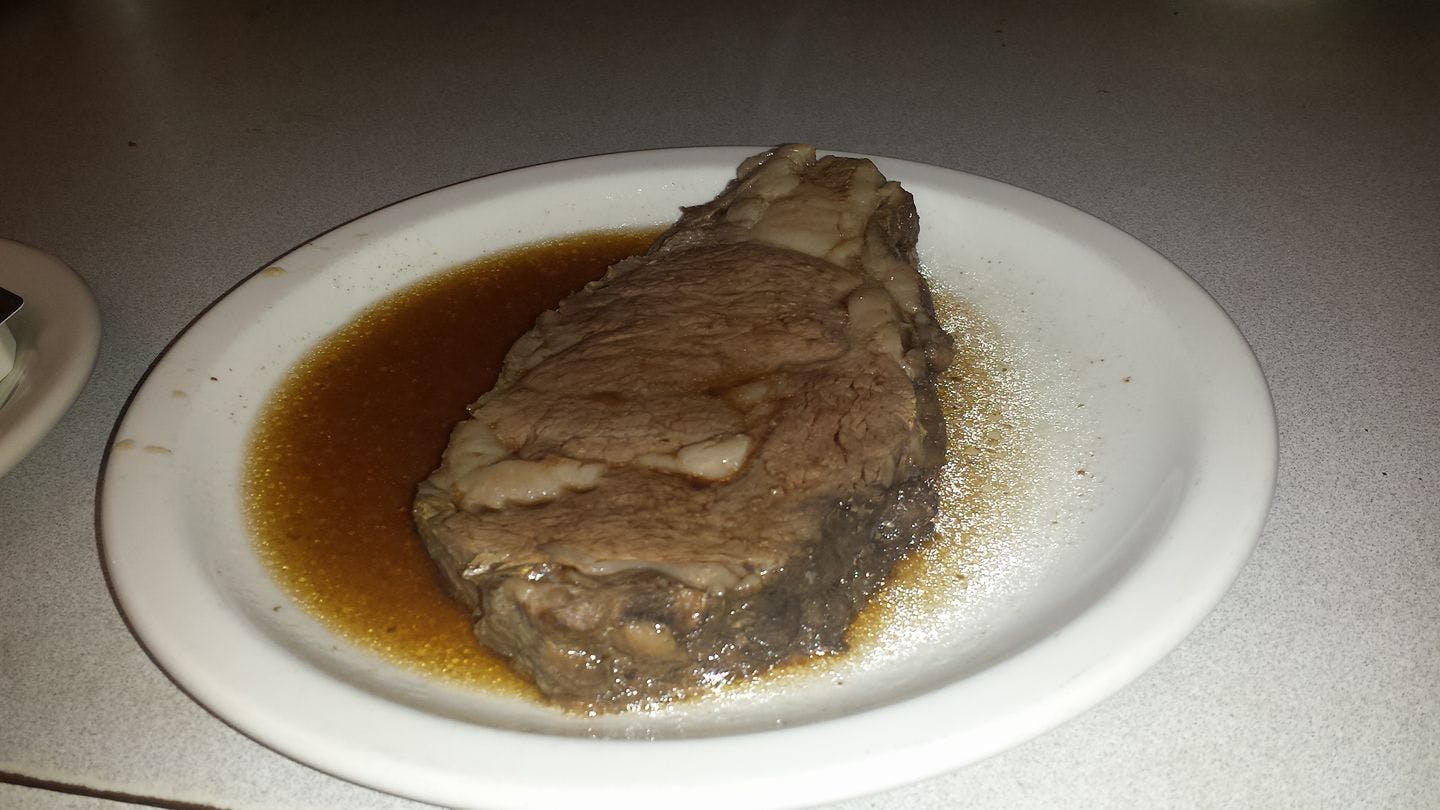 Order Prime Rib Special - Special food online from Angelos Restaurant & Pizza store, Spring Valley on bringmethat.com