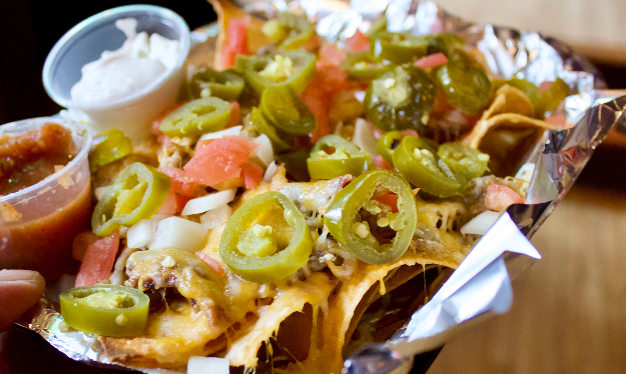 Order Nachos food online from Toons Bar & Grill store, Chicago on bringmethat.com