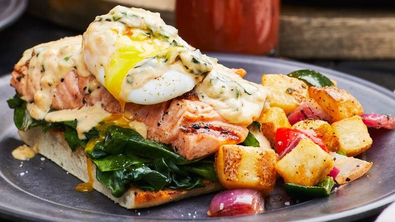 Order Grilled Salmon Benedict* food online from Firebirds Wood Fired Grill store, Knoxville on bringmethat.com