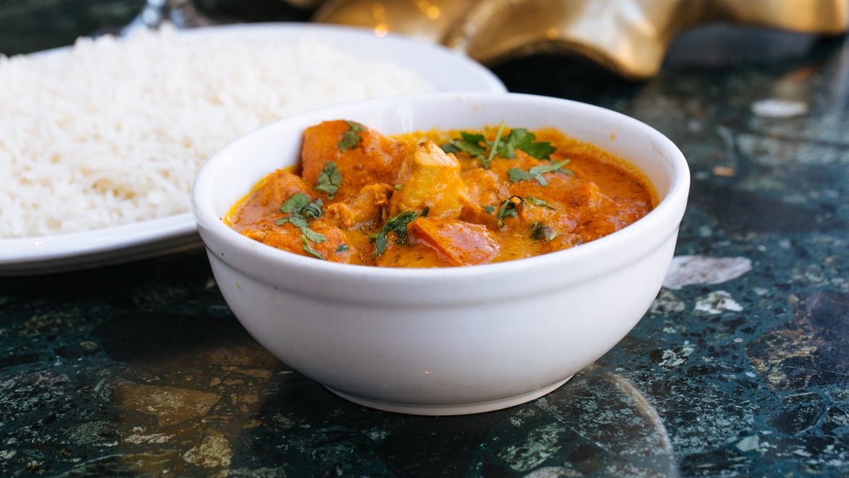 Order Chicken Curry food online from New Delhi Indian Restaurant store, Philadelphia on bringmethat.com