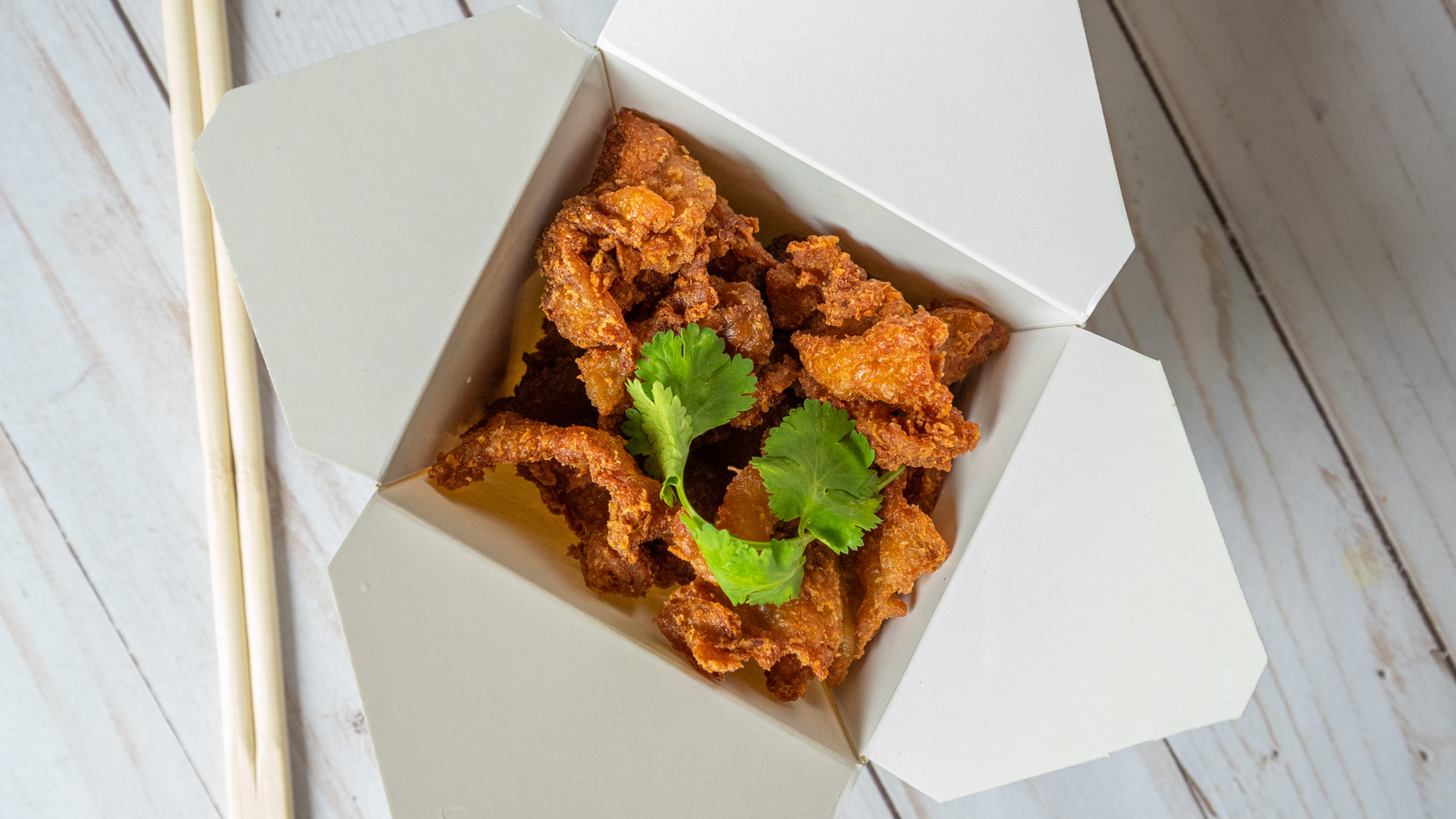 Order Fried Chicken skin (limited) food online from The Chicken Hawkers store, Vacaville on bringmethat.com