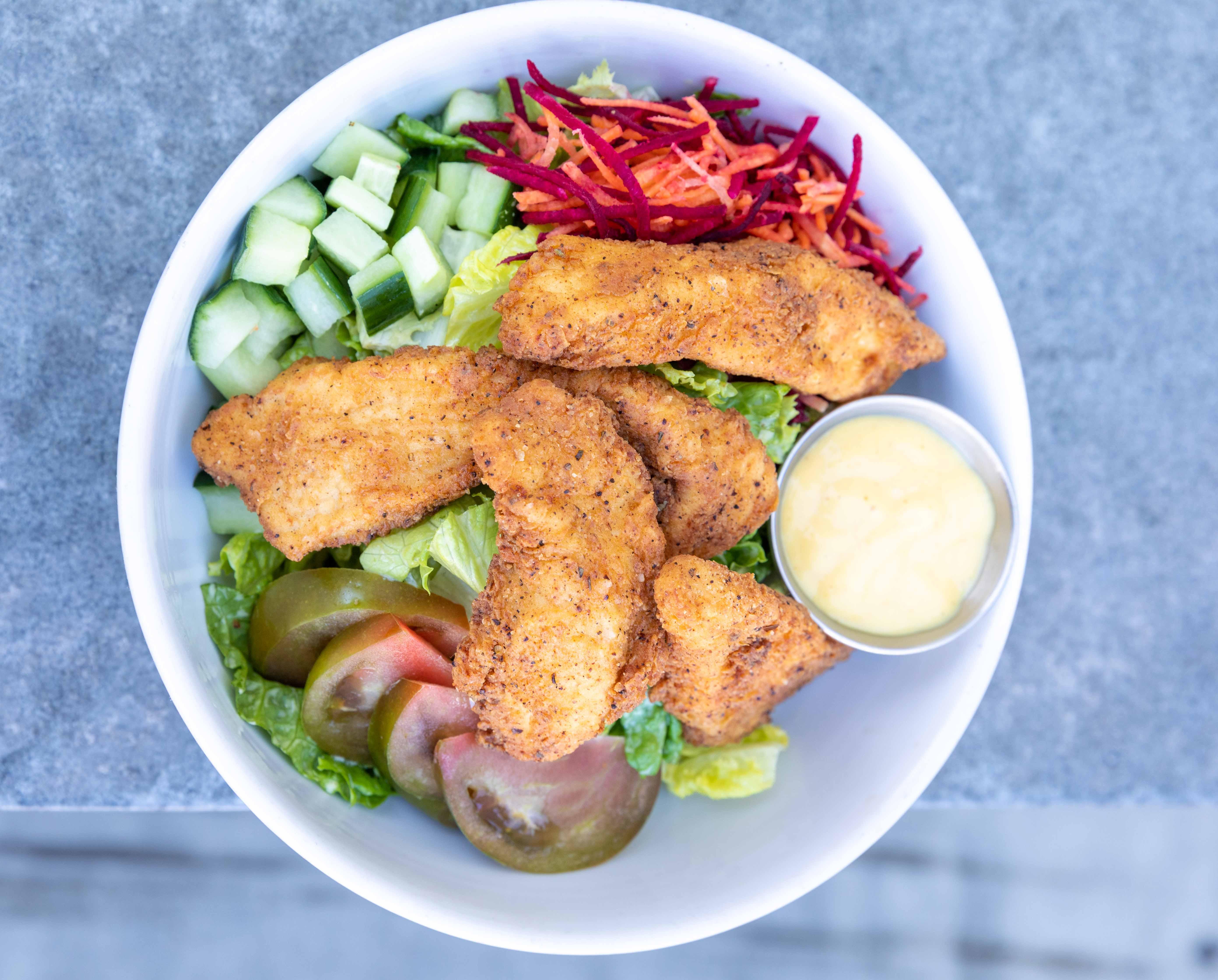 Order Cajun Chicken Tender Salad food online from Pono Burger store, Santa Monica on bringmethat.com