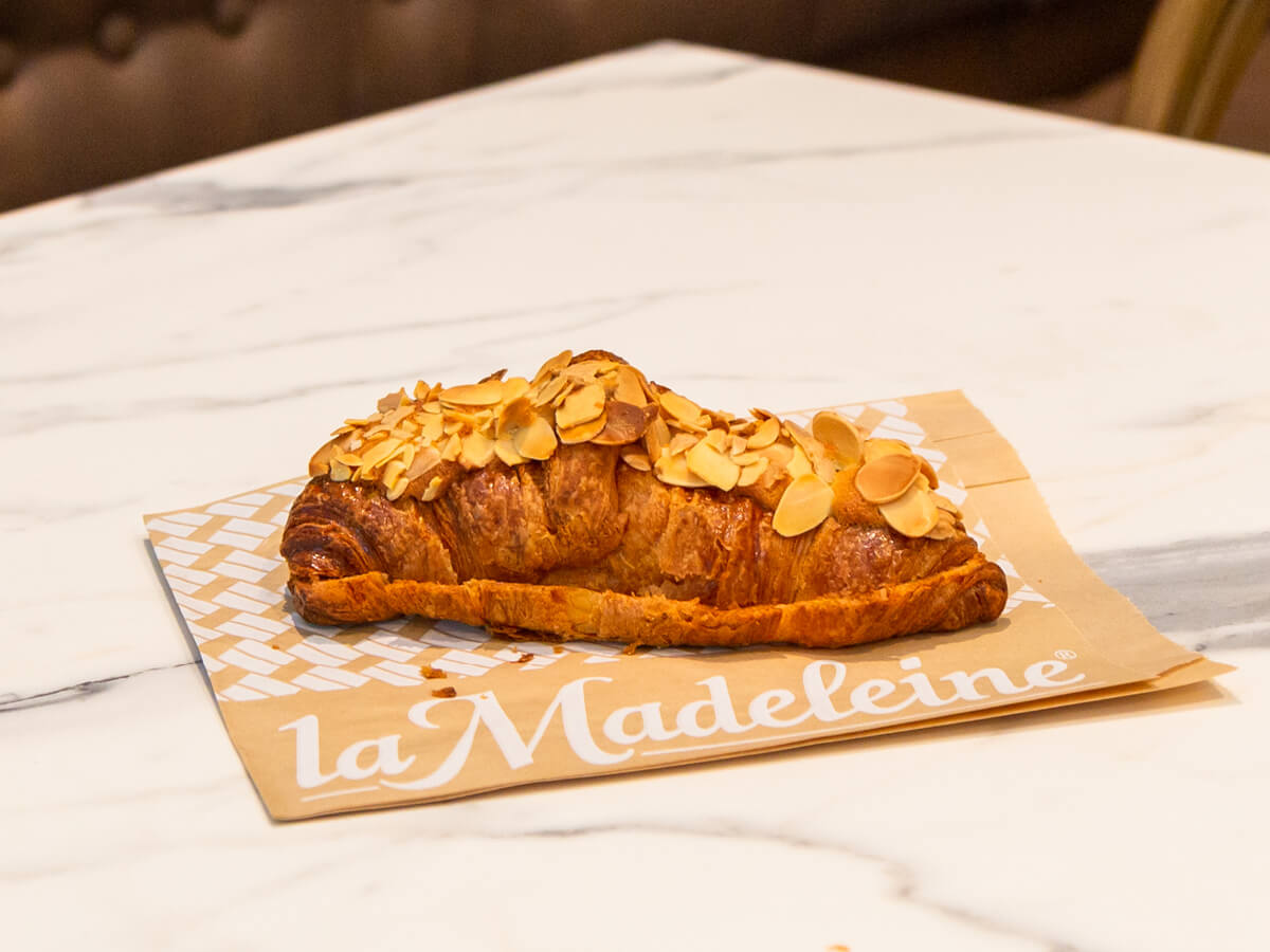 Order Almond Croissant food online from La Madeleine store, Dallas on bringmethat.com