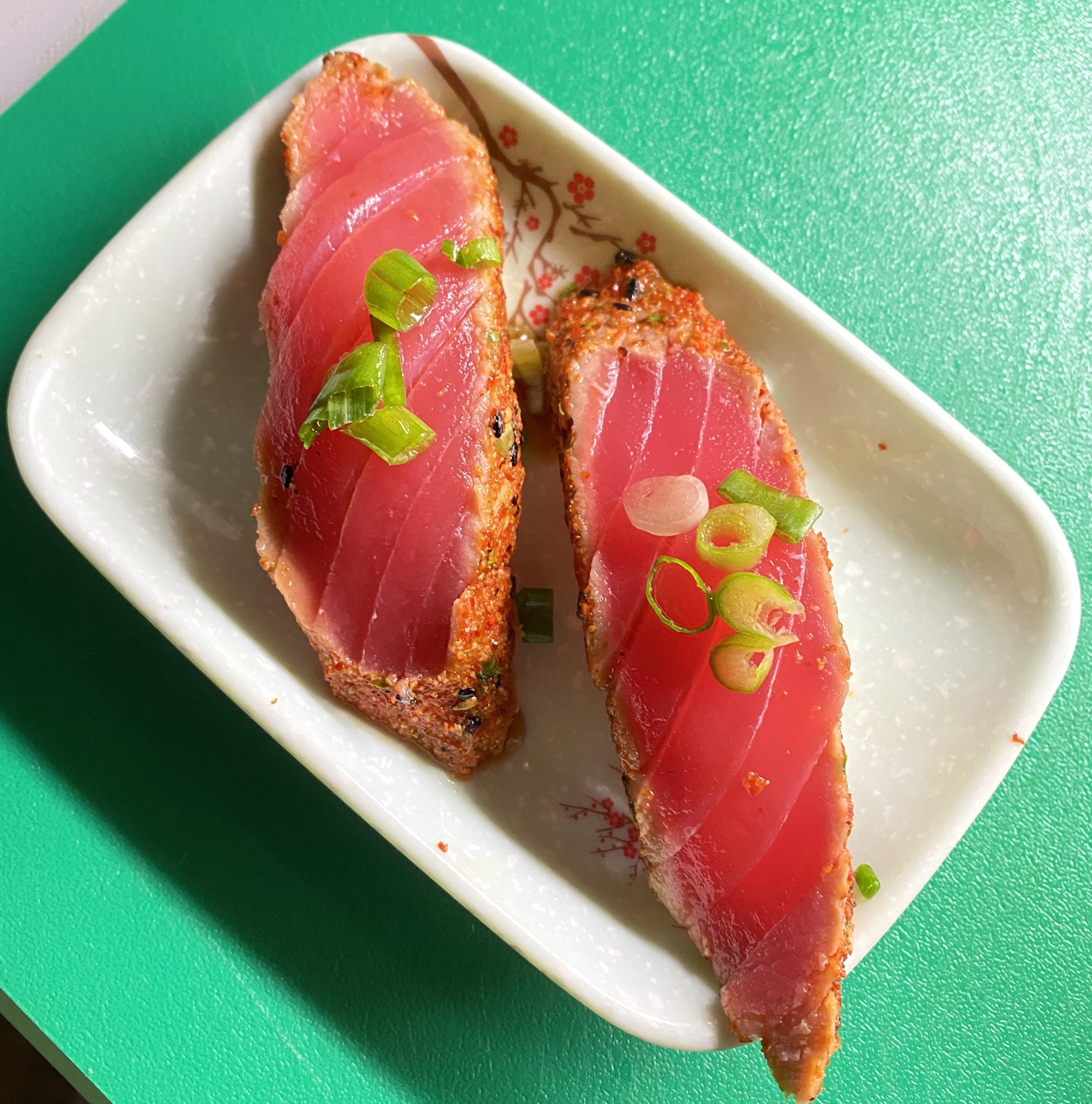 Order 47. Blackened Tuna Nigiri 煎吞拿鱼贴面 food online from Tengu Sushi store, Newport on bringmethat.com
