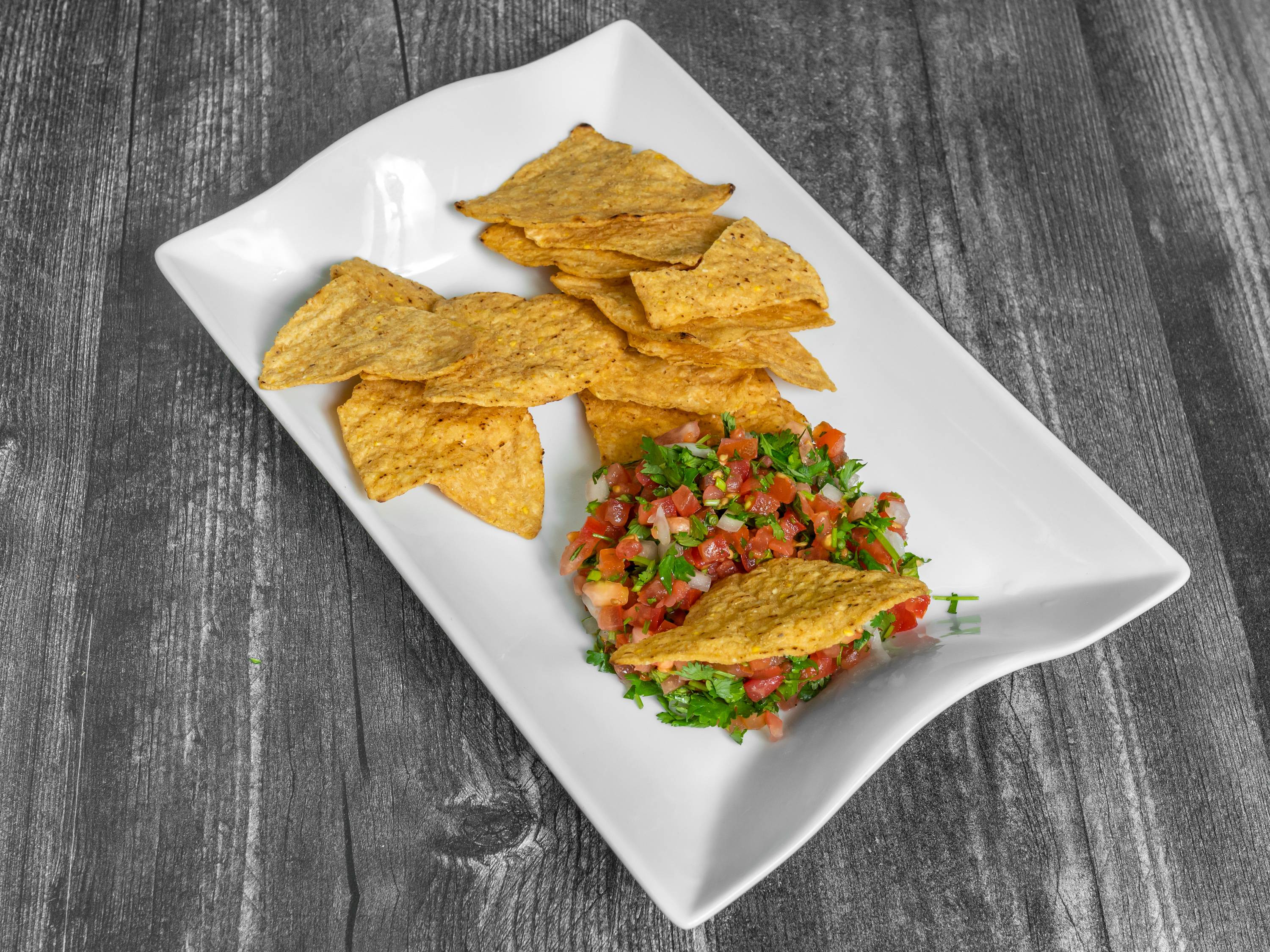 Order Pico de Gallo and Chips food online from Marvins Tacos store, Belvidere on bringmethat.com