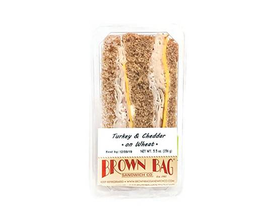 Order Turkey and Cheddar Triangle on Wheat food online from Johnny Rockets store, Aliso Viejo on bringmethat.com