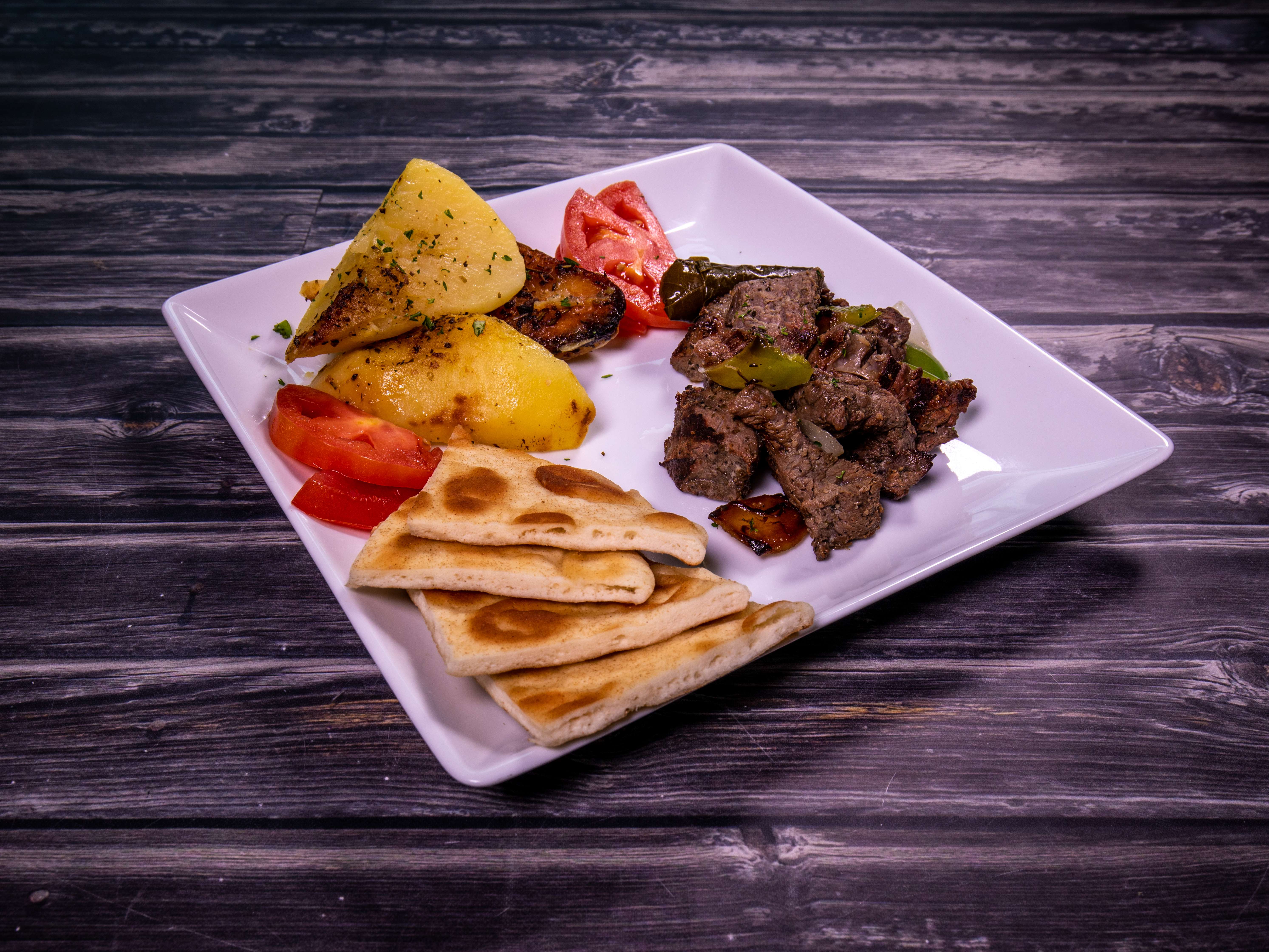 Order Souvlaki Plate food online from Sokols' Greek Deli Cafe store, Houston on bringmethat.com
