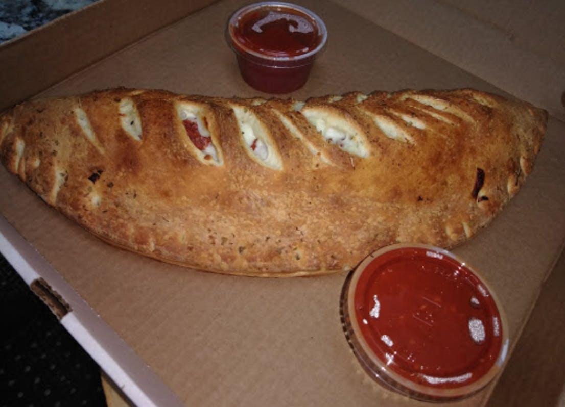 Order Italian Special Calzone - Calzone food online from Mama Mia's Pizzeria store, Wilson on bringmethat.com