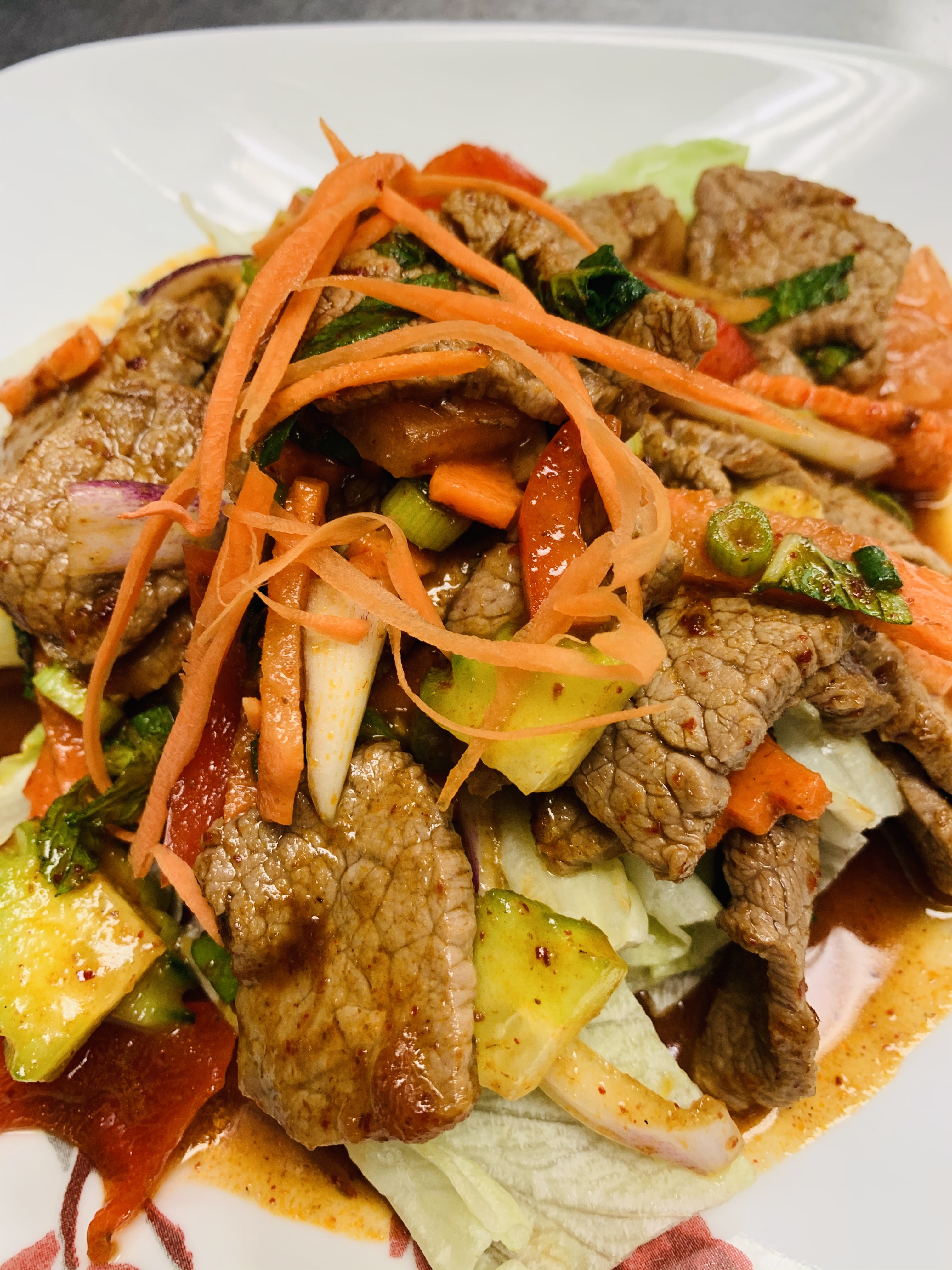 Order 34. Tiger Tear Salad food online from Sirinan Thai&Japanese Restaurant store, Wallingford on bringmethat.com