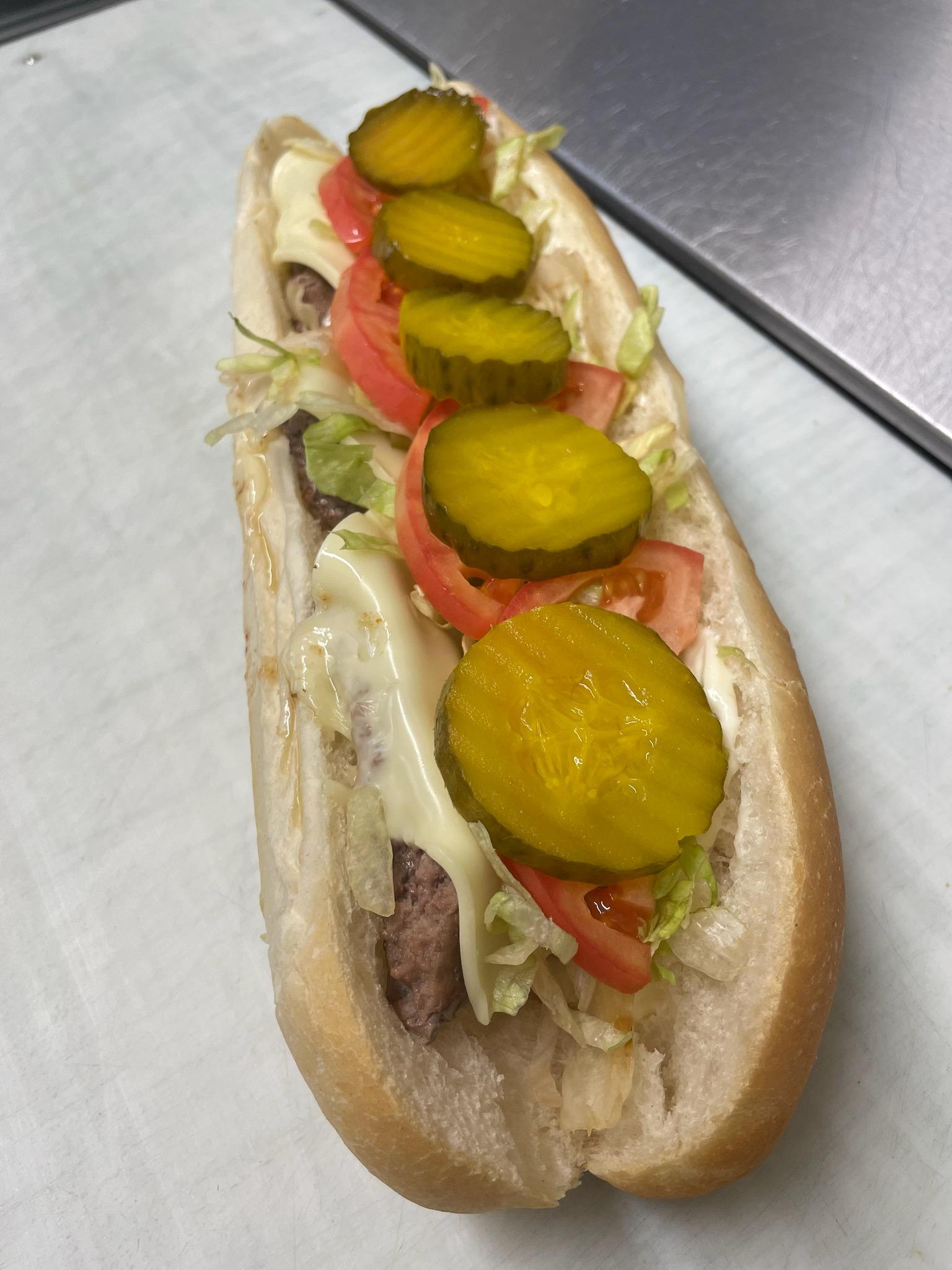 Order Large Cheeseburger Sub food online from Slugger's Pizzeria store, Lancaster on bringmethat.com