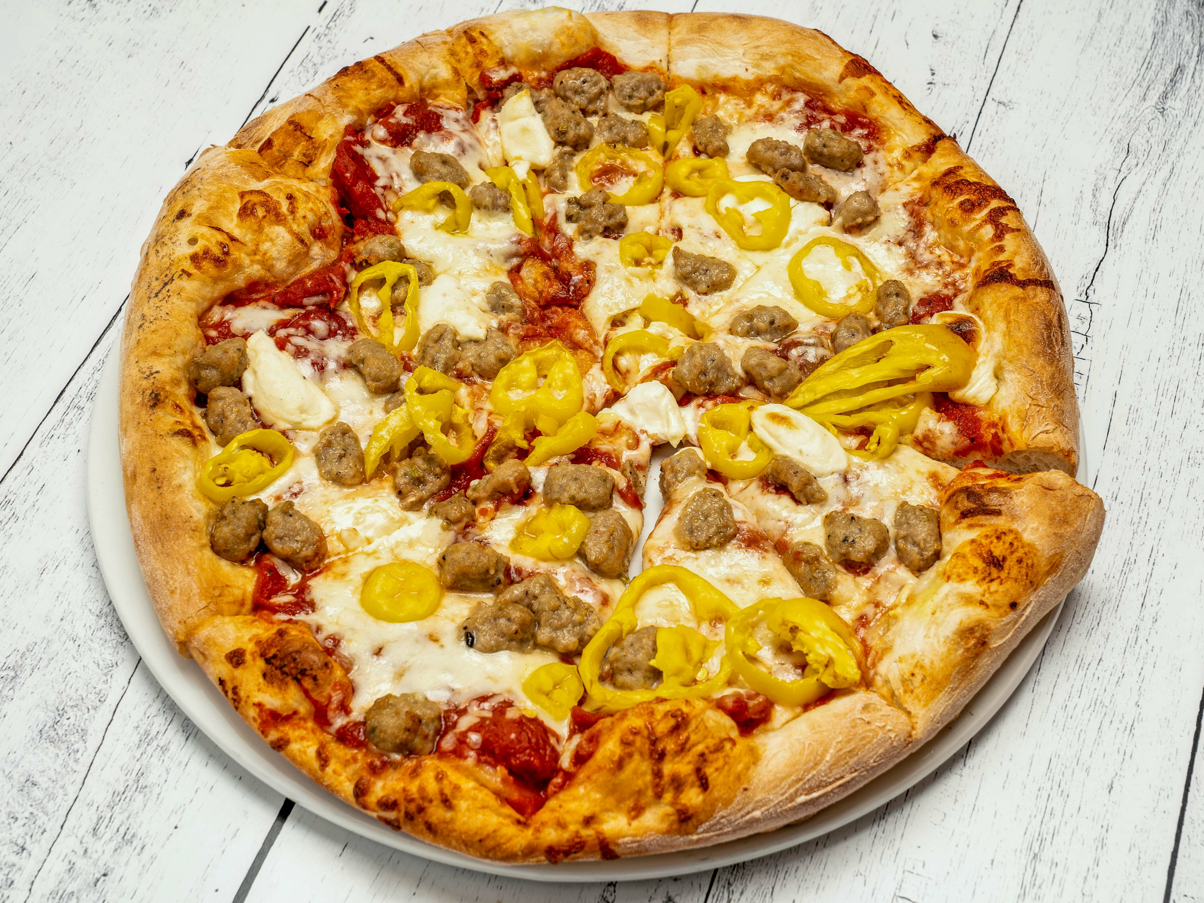 Order Sausage and Ricotta Pizza food online from Salvatore's Restaurant store, Lawrence on bringmethat.com