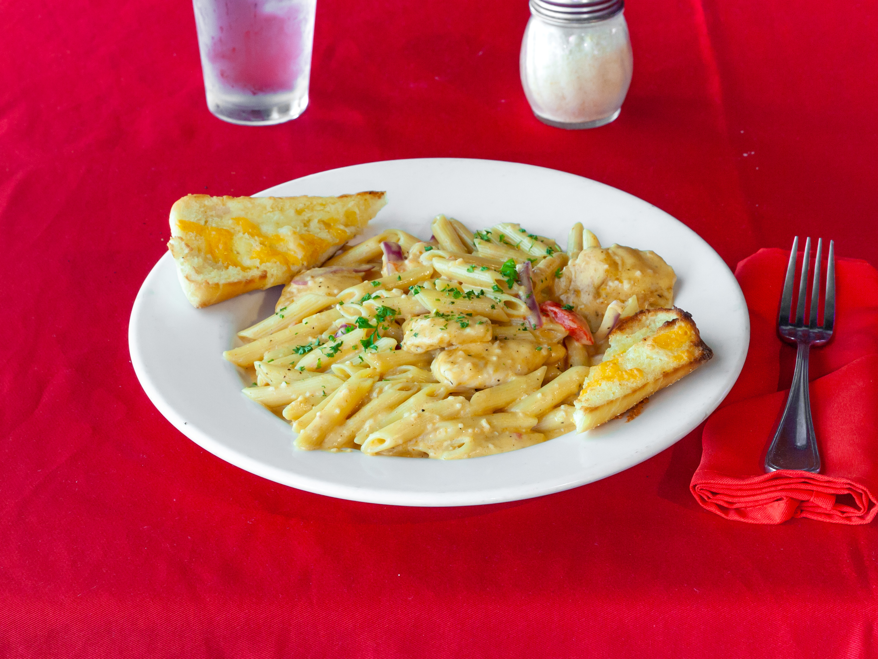 Order Cajun Chicken Penne Pasta food online from Tailgaters Sports Bar & Grill store, Bolingbrook on bringmethat.com