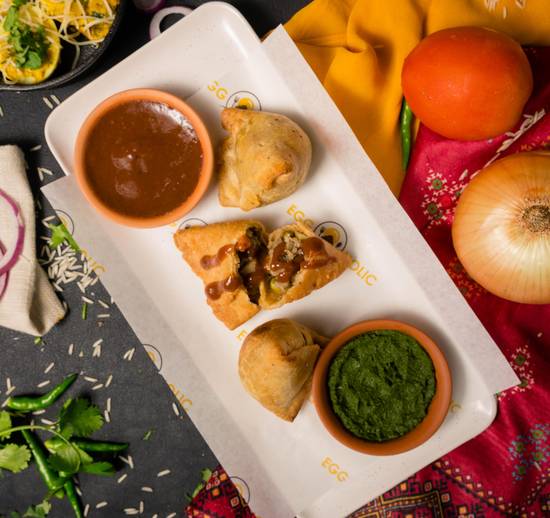 Order Samosas - 2 Pieces food online from EggHolic store, Irving on bringmethat.com