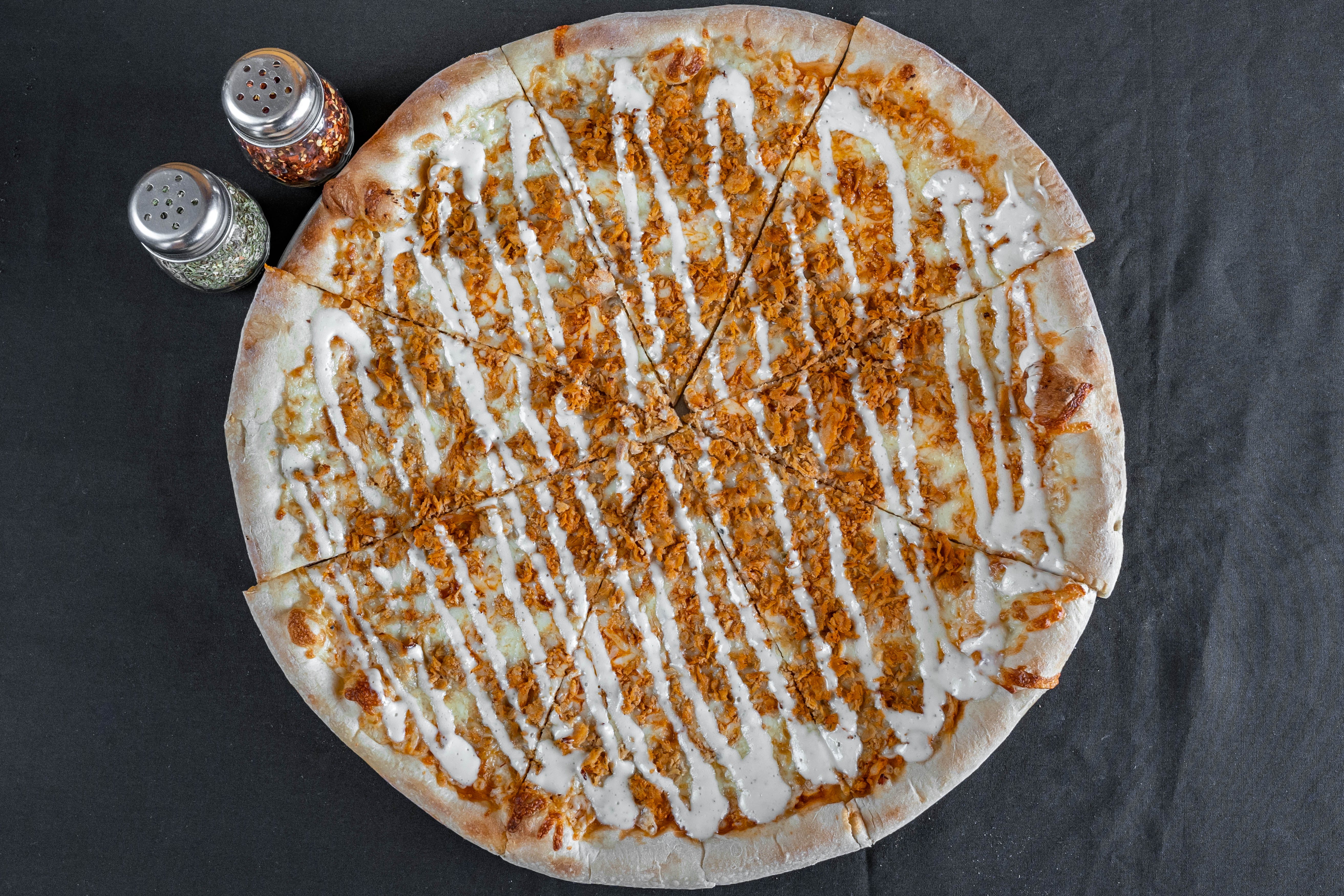 Order Buffalo Chicken Pizza - Personal 10'' food online from Nicos Pizza store, New Britain on bringmethat.com