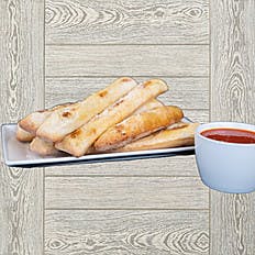 Order Bubba Bread Sticks - Side food online from Big Daddys Pizza store, Midvale on bringmethat.com