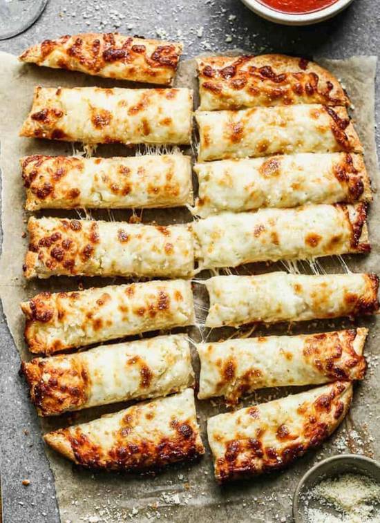 Order Garlic Cheese Breadsticks food online from The Pizza Cutters store, Syracuse on bringmethat.com