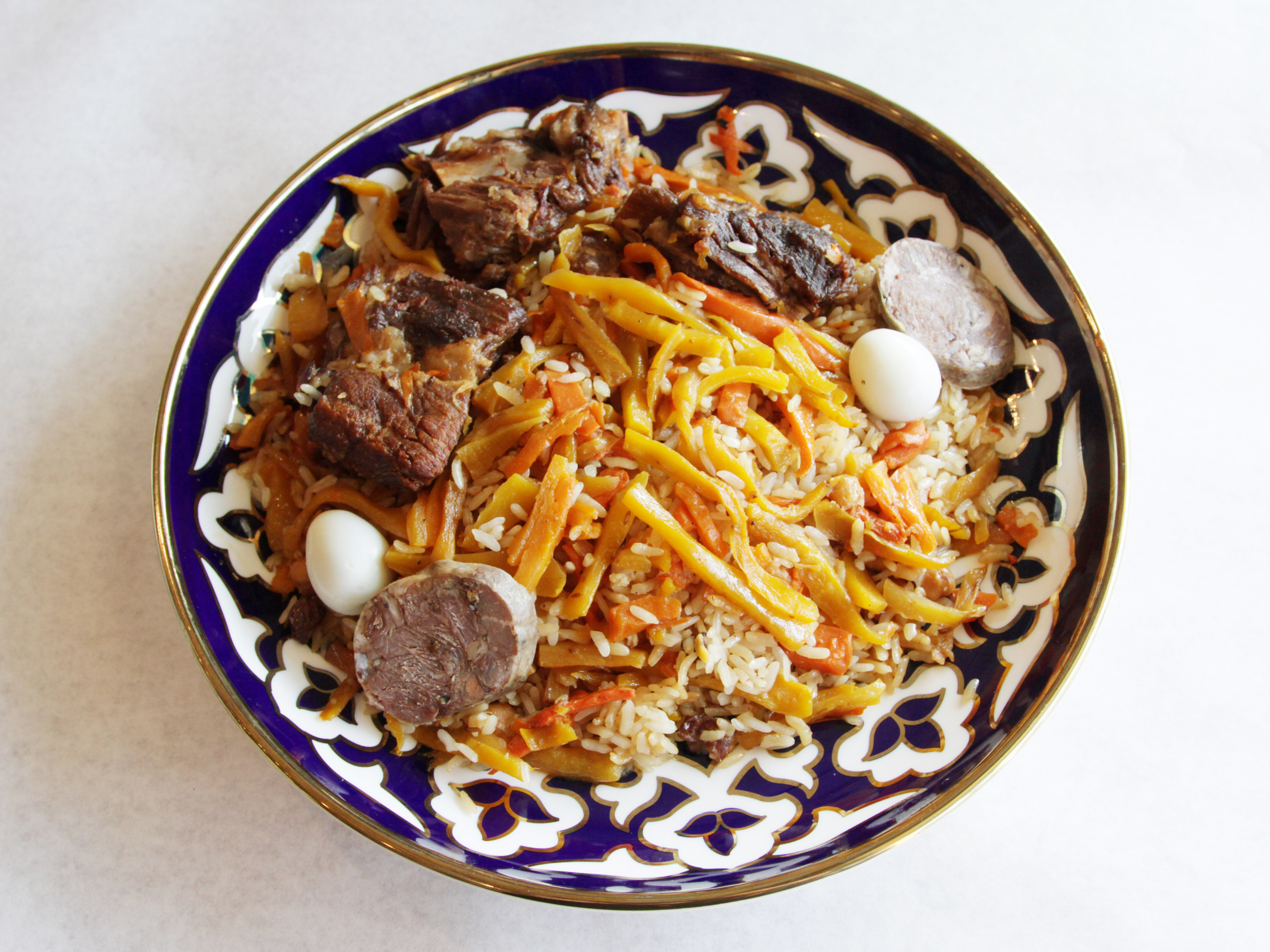 Order Uzbek Plov food online from Taj Kebab store, Brooklyn on bringmethat.com