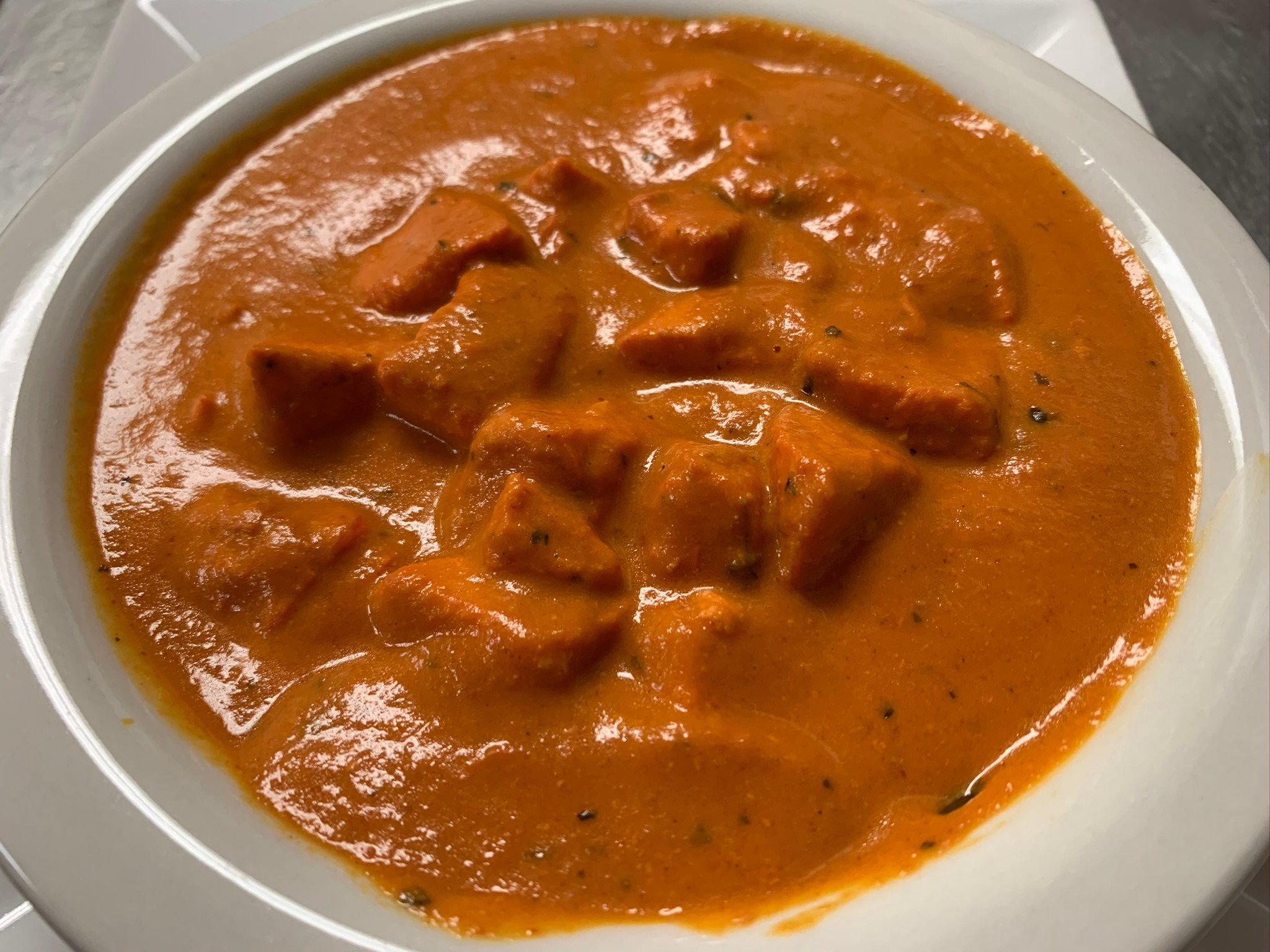 Order (CN) Butter Chicken food online from Ricenroti store, Plano on bringmethat.com