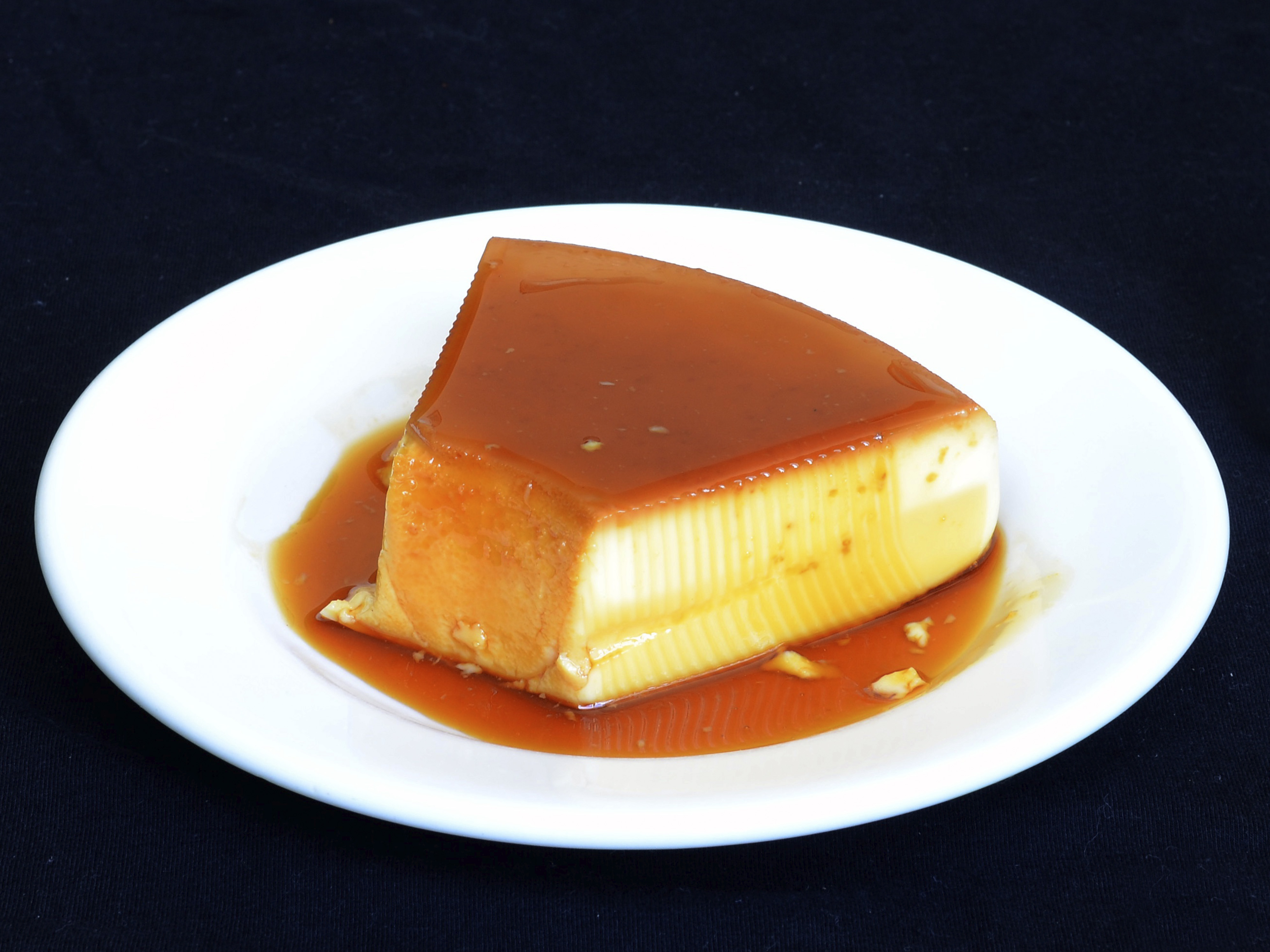 Order Flan food online from Mr Pizza Man store, Richmond on bringmethat.com