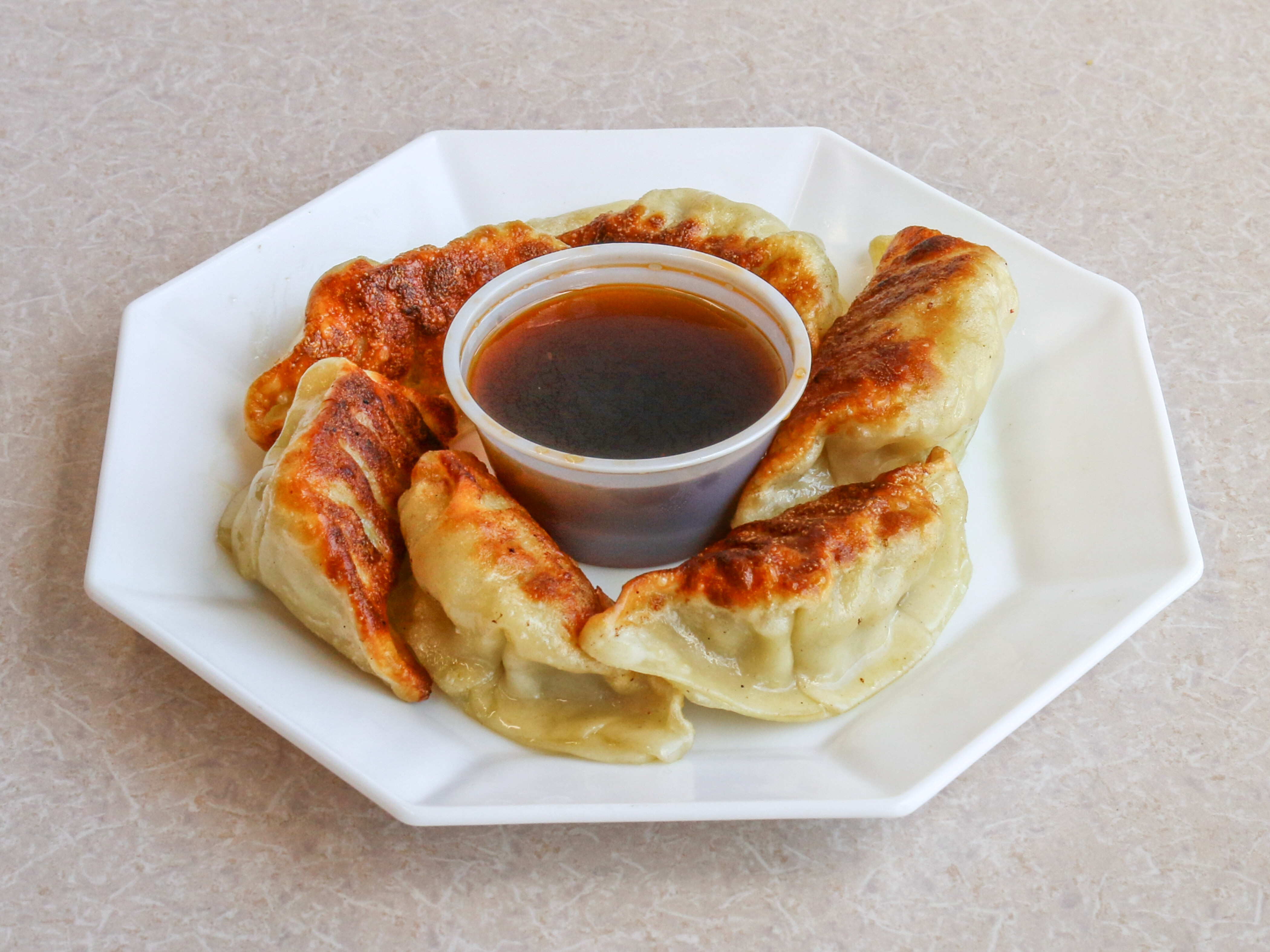 Order 6 Piece Pot Stickers food online from Bamboo Cafe store, Bakersfield on bringmethat.com