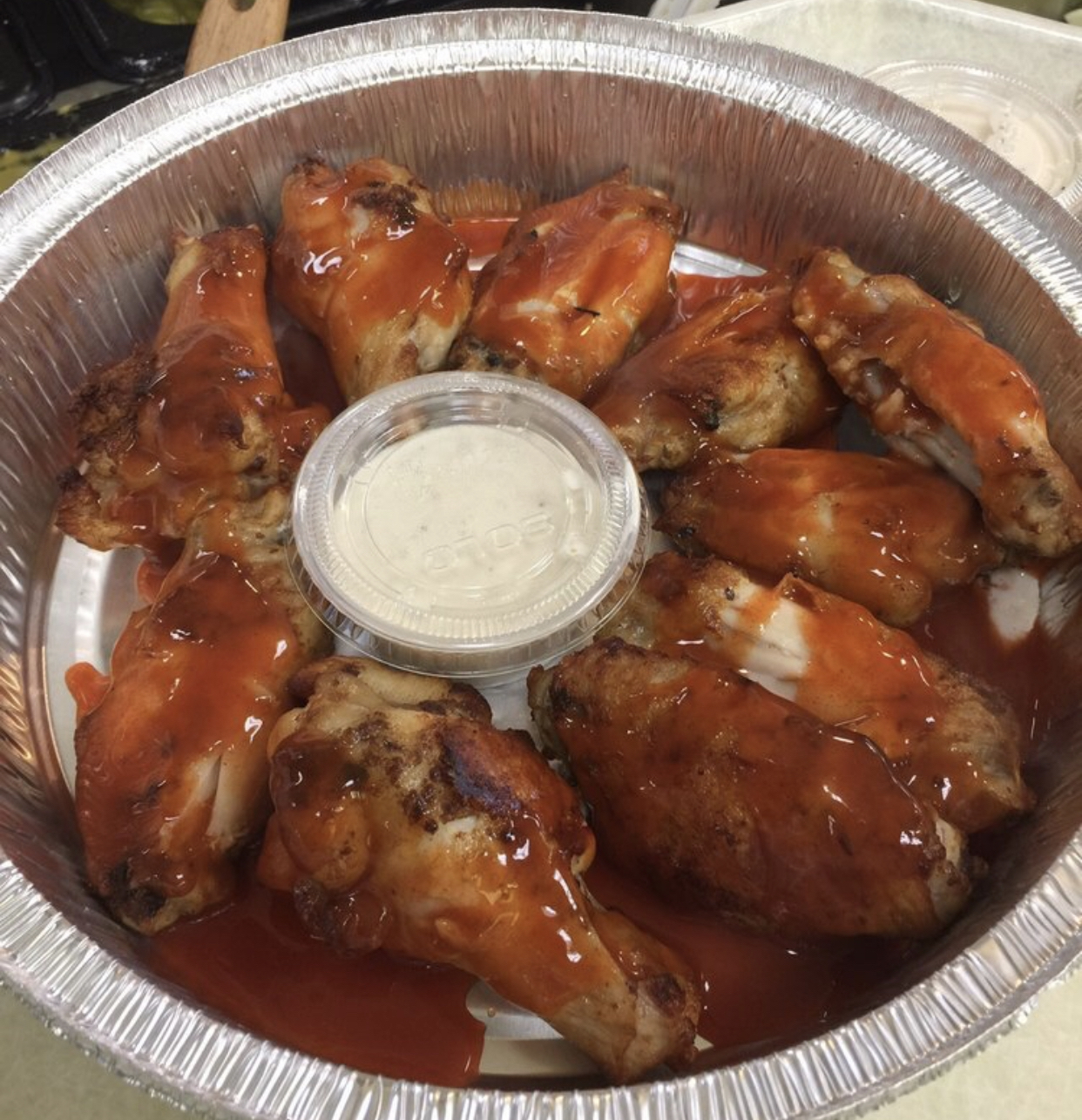 Order 15 wings food online from Vino's Pizzeria store, Greensboro on bringmethat.com