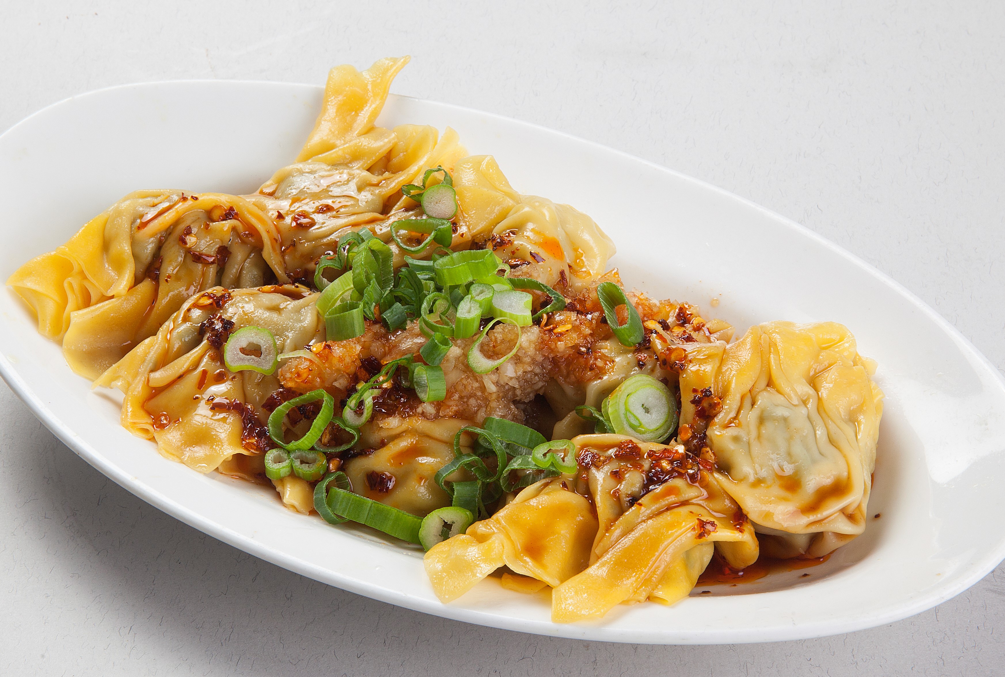 Order 8 Piece Wonton in Chili Sauce food online from Canaan Restaurant Chinese Cuisine store, West Covina on bringmethat.com