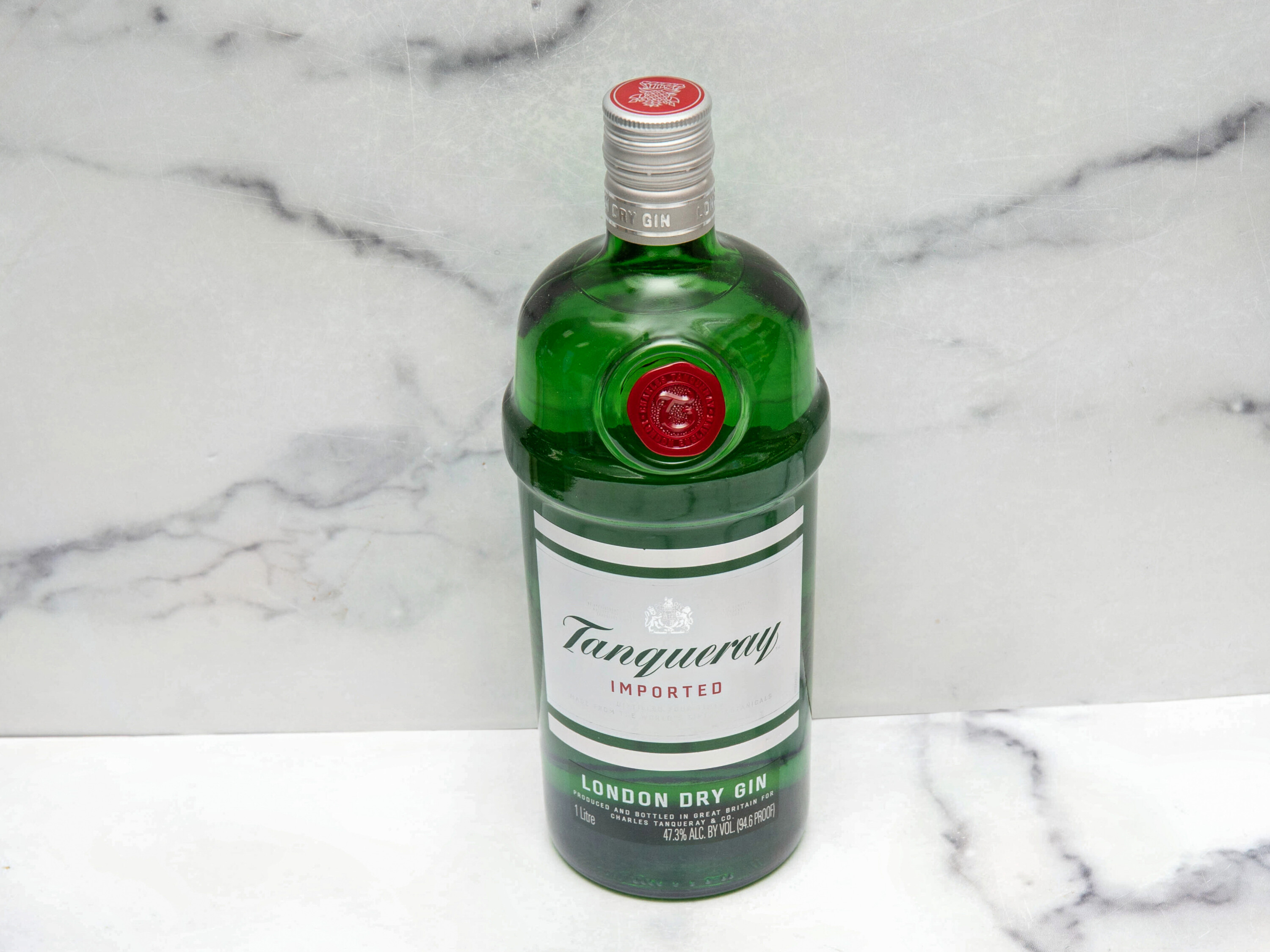 Order Tanqueray London Dry Gin, 94.6 Proof food online from Dream Mart Liquor store, Huntington on bringmethat.com