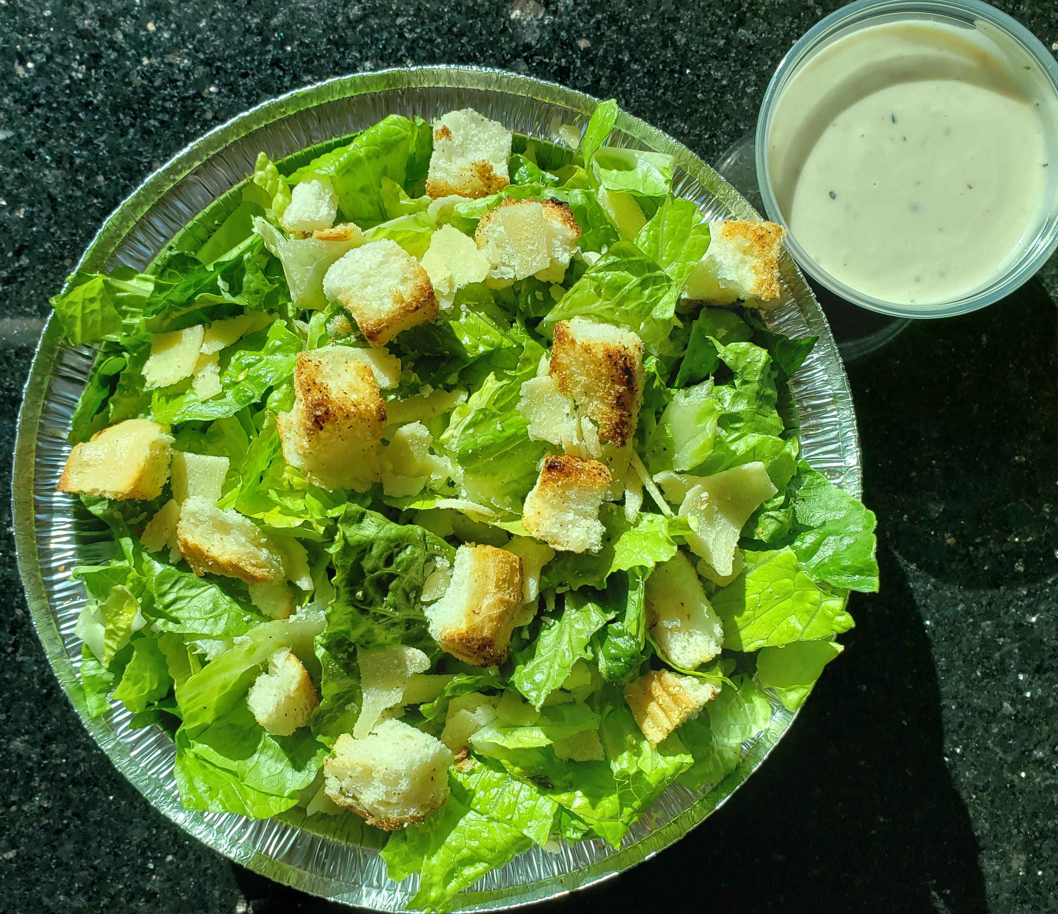 Order Caesar Salad - Medium food online from Grecos New York Pizzeria store, Thousand Oaks on bringmethat.com