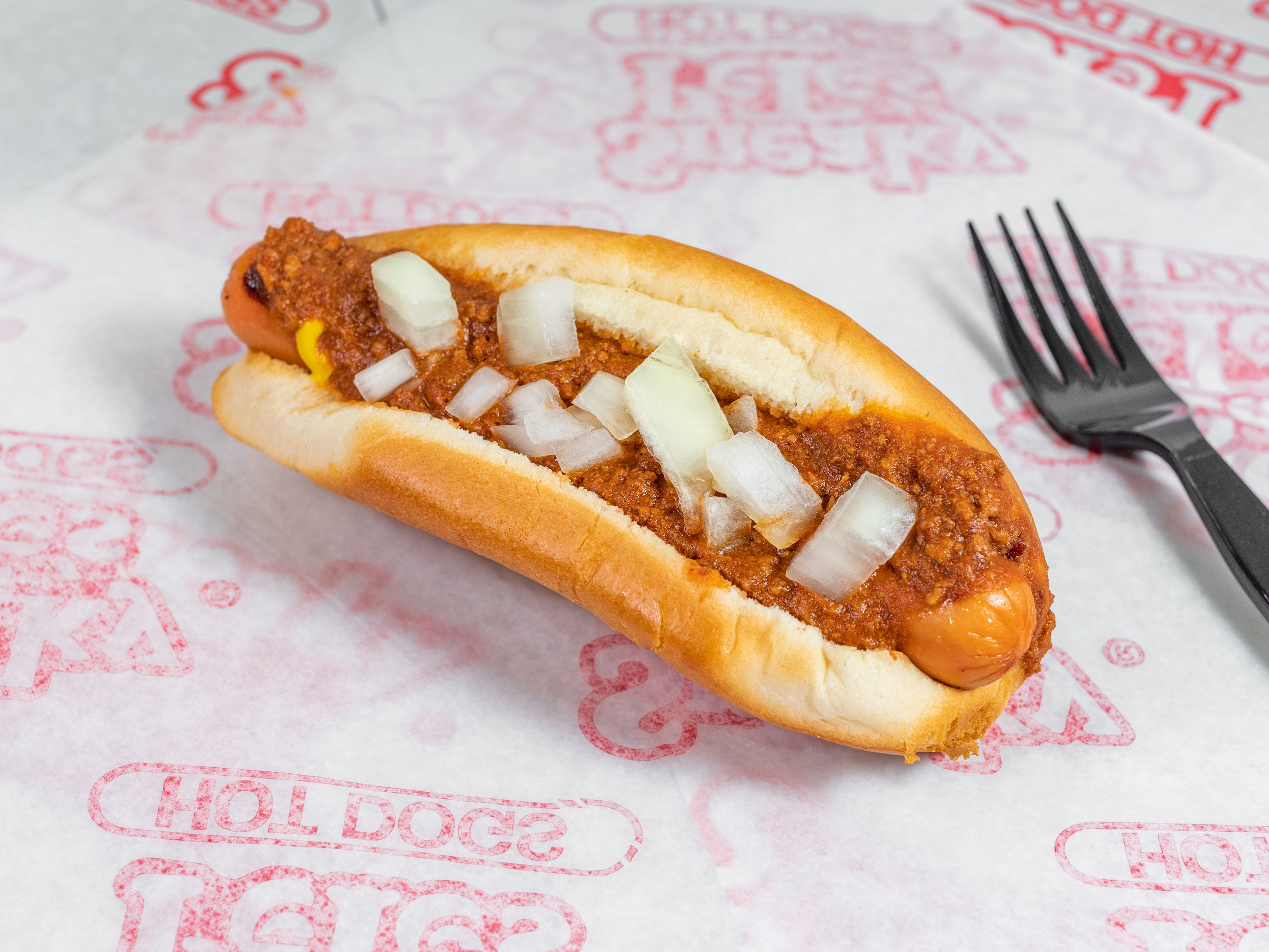 Order 4. Famous Chili Dog food online from Sneaky Petes Hot Dogs store, Hoover on bringmethat.com