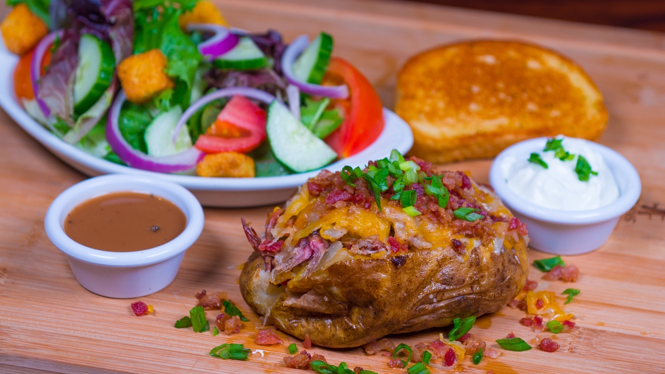 Order Stacked Baked Potato & Salad food online from Smokey Bones store, Peachtree City on bringmethat.com