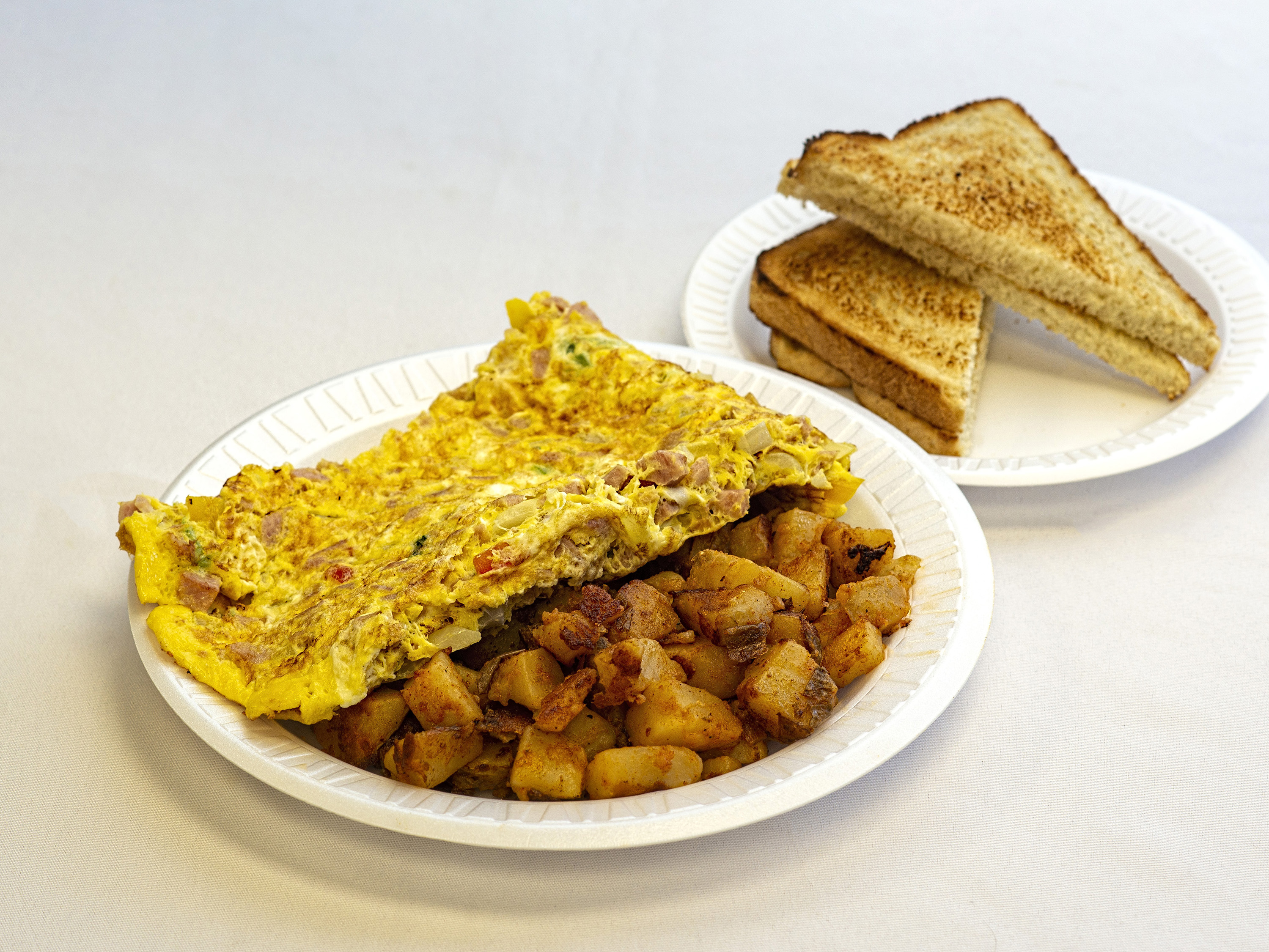 Order Western Omelette food online from Hot Bagels Abroad store, Clifton on bringmethat.com