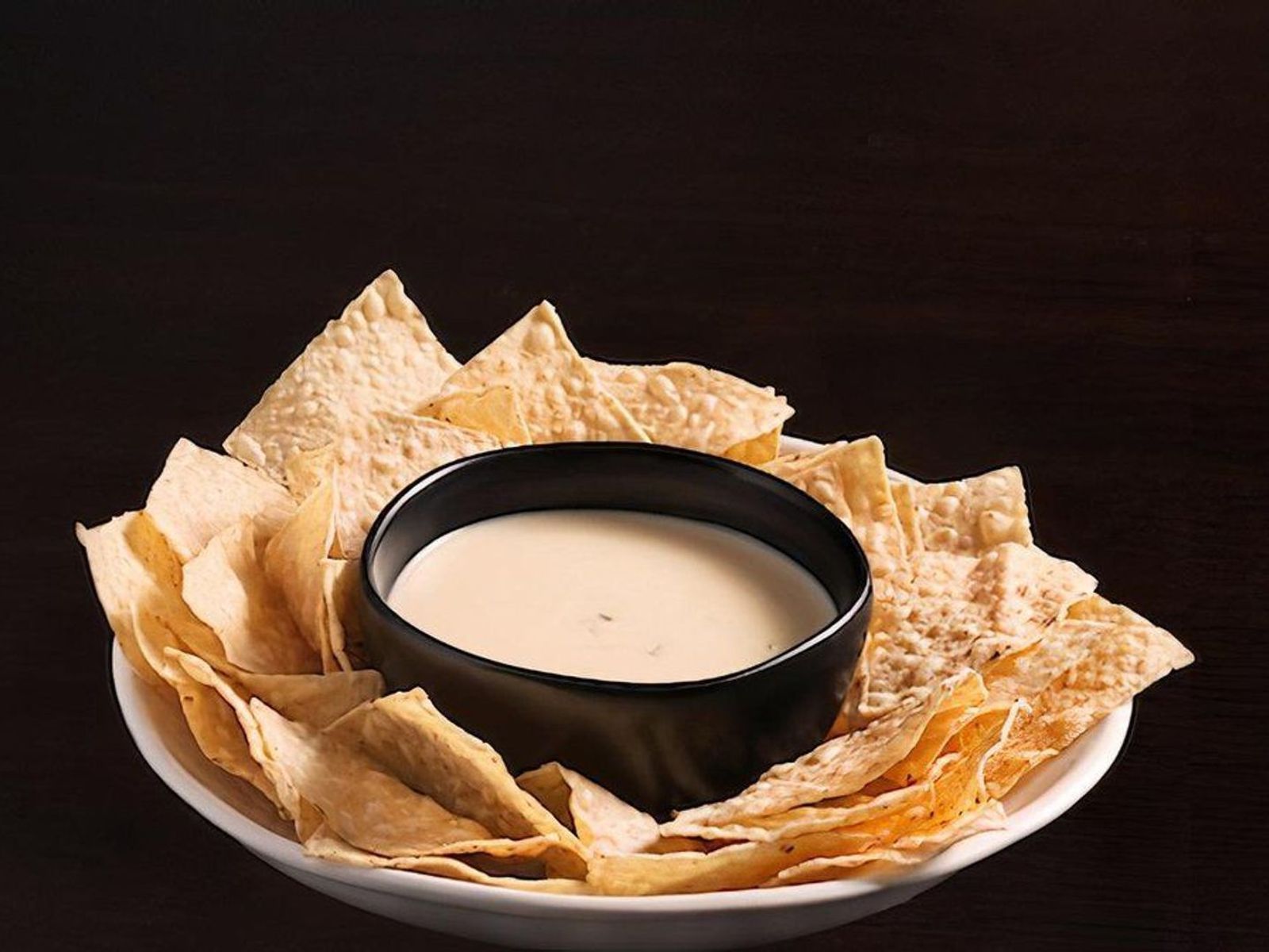 Order White Queso & Chips food online from El Fresco Mexican Grill store, Centreville on bringmethat.com