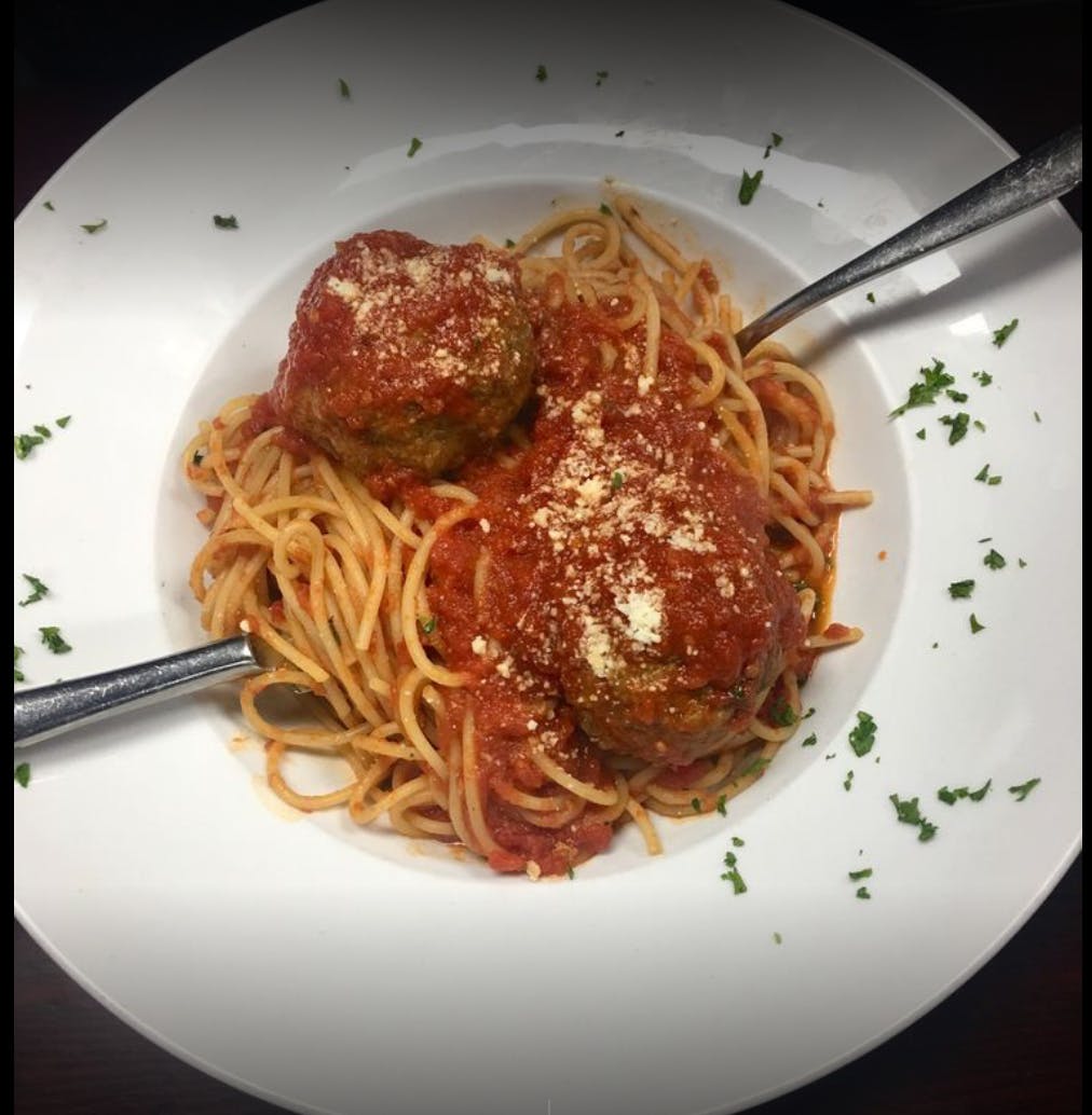Order Spaghetti with Meatballs - Pasta food online from Amici Pizza store, Peekskill on bringmethat.com