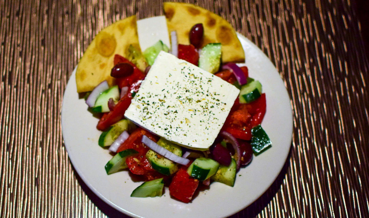 Order Small Horiatiki Salad food online from Mykonos Mayeron Auth Greek Cookery store, Longwood on bringmethat.com