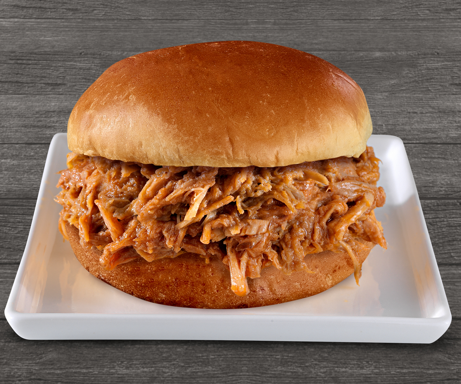 Order BBQ Pulled Pork Sandwich food online from Brown Chicken store, Naperville on bringmethat.com