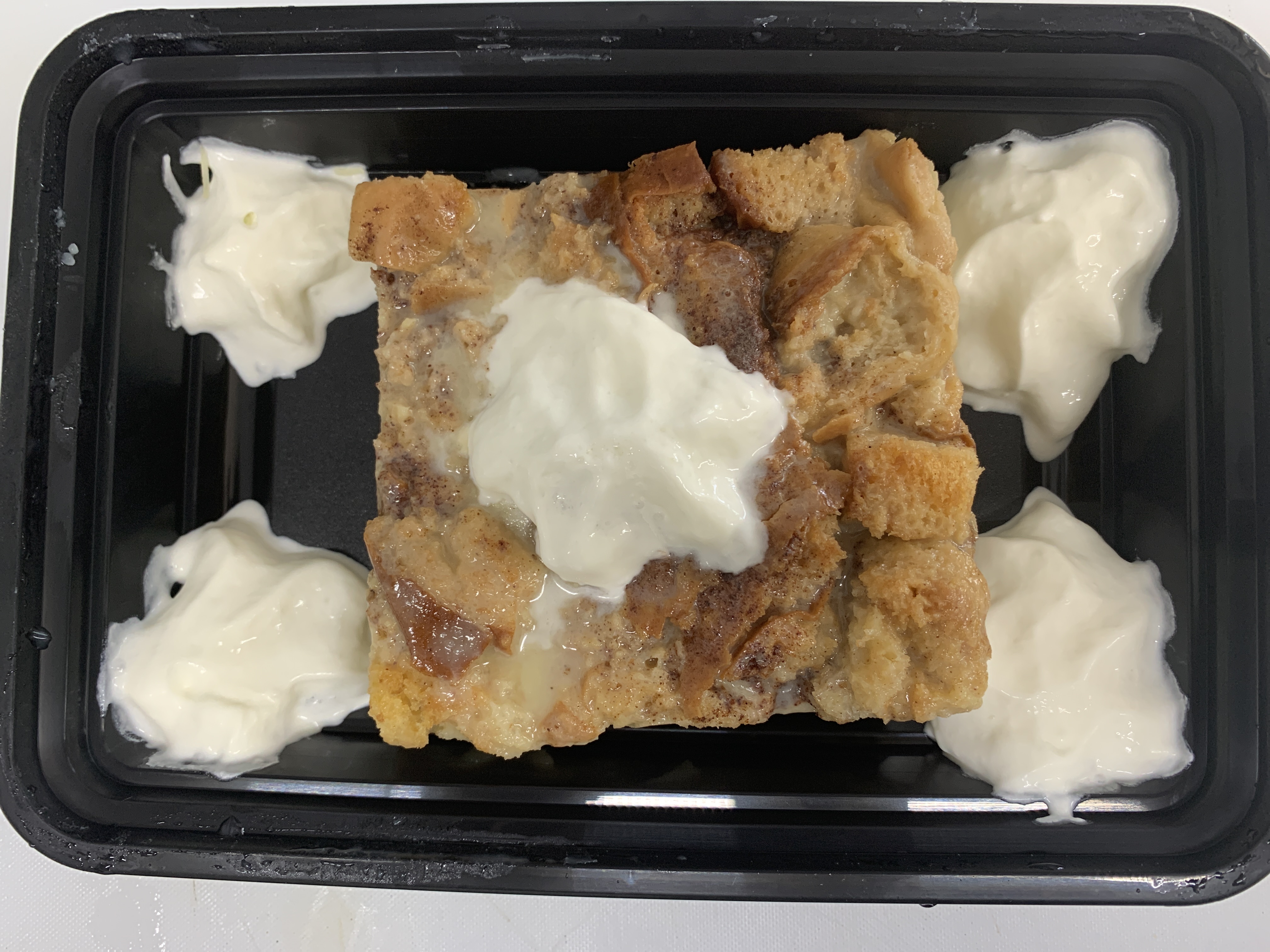 Order Bread Pudding with Rum Sauce food online from It's A Blackburn Thing!! store, Austin on bringmethat.com