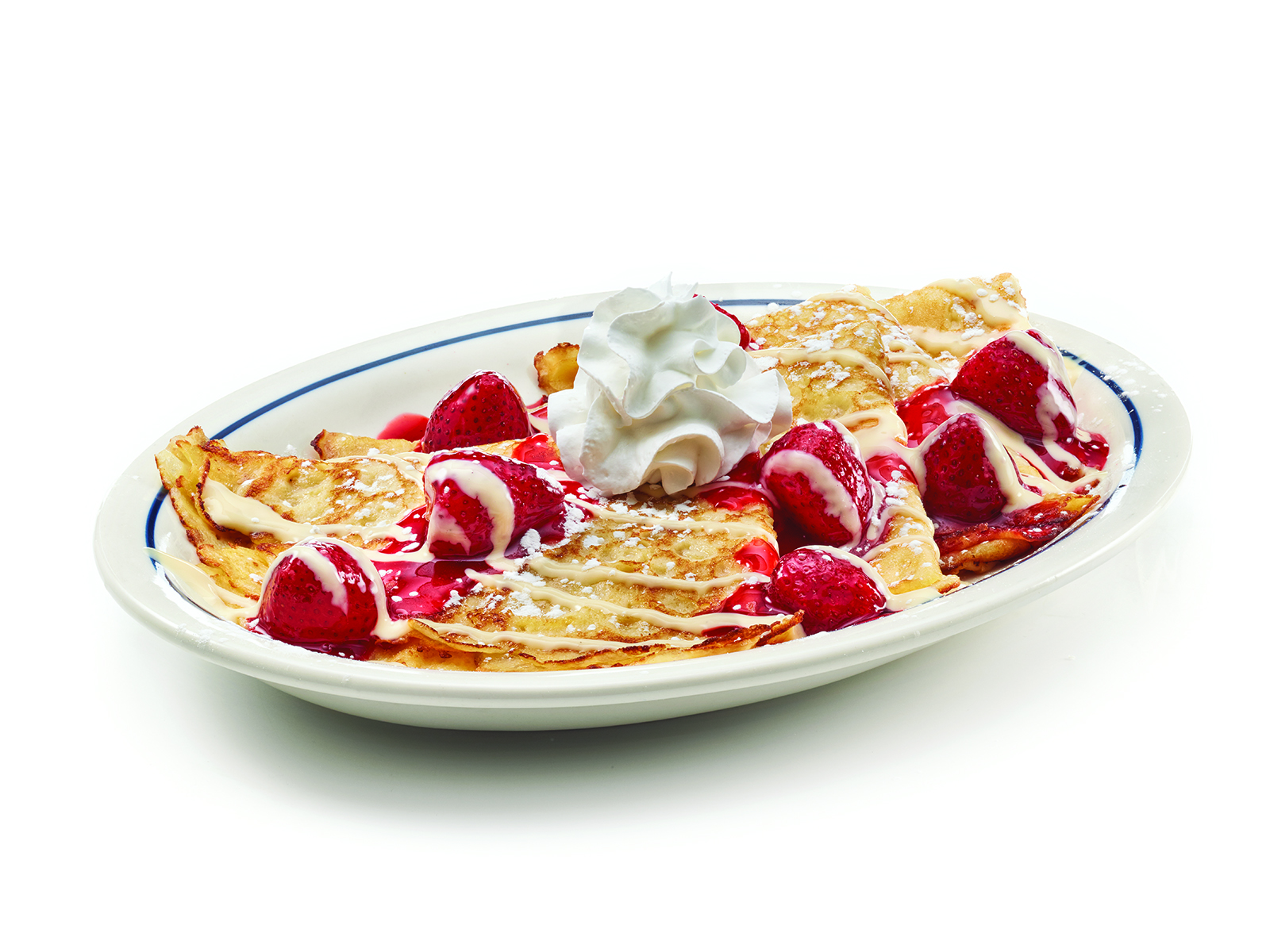 Order Strawberries & Cream Crepes food online from IHOP store, Rochester on bringmethat.com