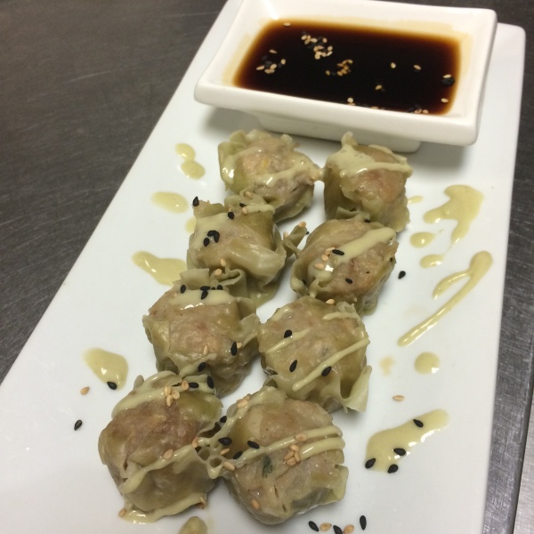Order 8 Wasabi Dumplings food online from Thai Tea Asian Fusion Cafe  store, Irving on bringmethat.com